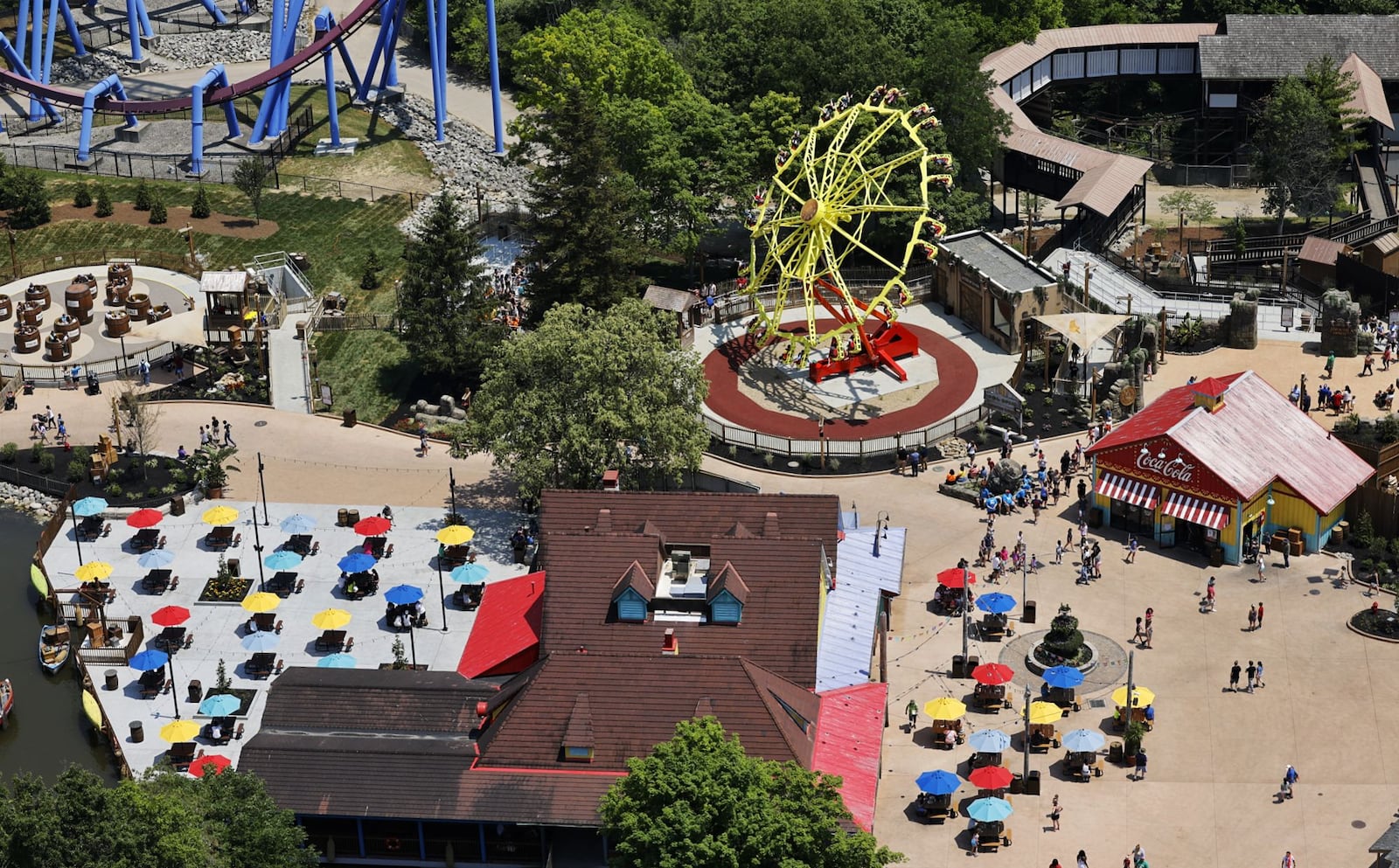 Kings Island visitors got to experience the newest themed area "Adventure Port" before the official opening day Friday, June 9, 2023 in Mason. The area features Enrique's Restaurant and Mercados Patio Bar, Adventure Express coaster and two new rides, Sol Spin and Cargo Loco. NICK GRAHAM/STAFF