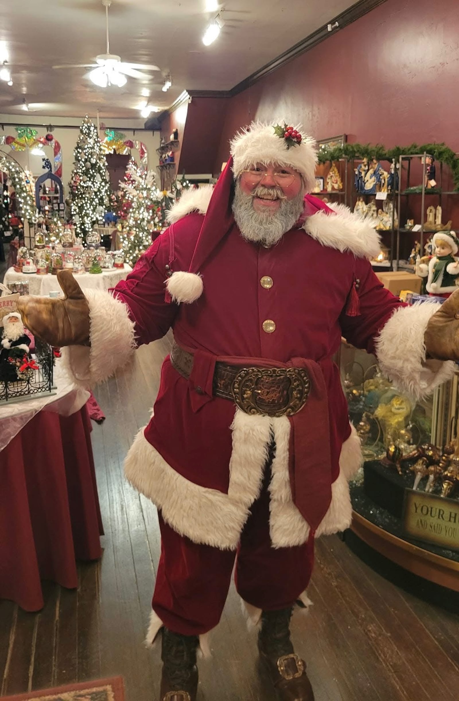 Mike Paugh, 39, of Trenton, dresses up as Santa and appears in Christmas parades, local schools and private events. PROVIDED PHOTO