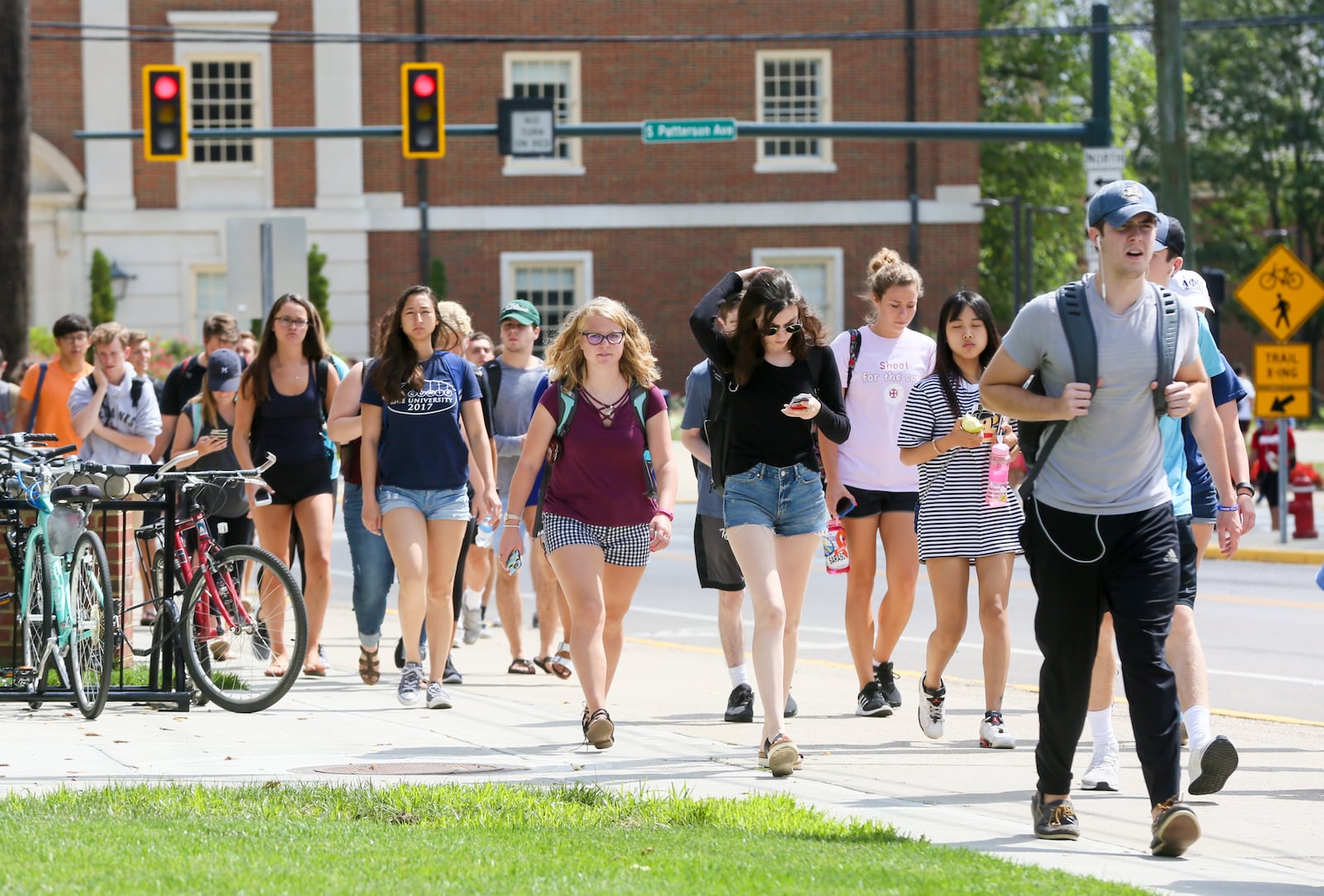 Students walk between class periods on the campus of Miami University in Oxford, Wednesday, Aug. 30, 2017. GREG LYNCH / STAFF