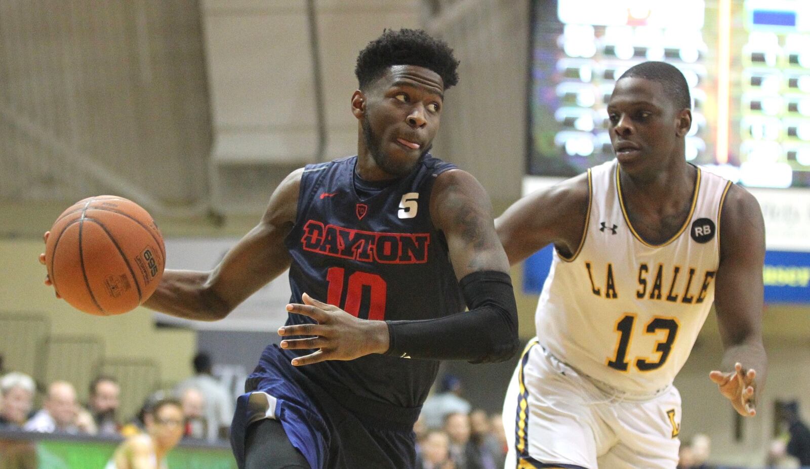 Dayton’s Jalen Crutcher drives to the basket against La Salle on Wednesday, Feb. 28, 2018, at Tom Gola Arena in Philadelphia. David Jablonski/Staff