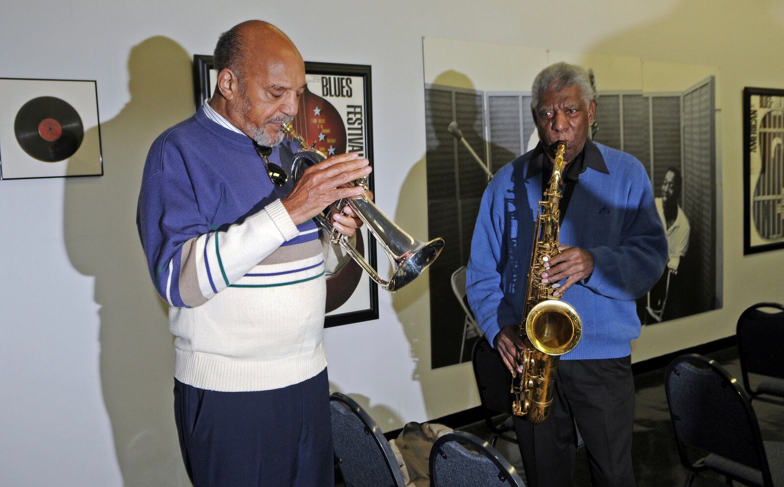 Trumpeter Art Hoyle, left, and saxophonist Gene Barge demonstrate the sounds of their instruments at Chess Recording Studio, on South Michigan Avenue, Thursday, Oct. 27, 2011, in Chicago. (John J. Kim/Chicago Sun-Times via AP)