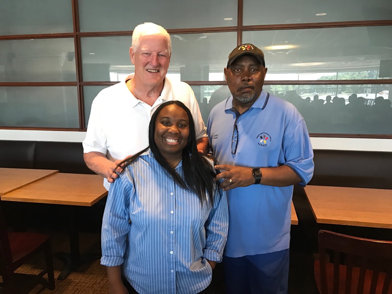 The Miami Valley coaching legends  -- Jim Pace (left) and Al Powell (right) – who are  the founders and ongoing co-chairs of the unique 7 on 7 Social Justice Football jamboree sponsored by the Miami Valley Football Coaches. With them is one of Tuesday’s keynote speakers, NaTasha Shabazz, a former college basketball player at Hiram College and a Bowling Green State University grad, who is a national speaker and an advisor to Lima City schools.  (Photo by Tom Archdeacon)