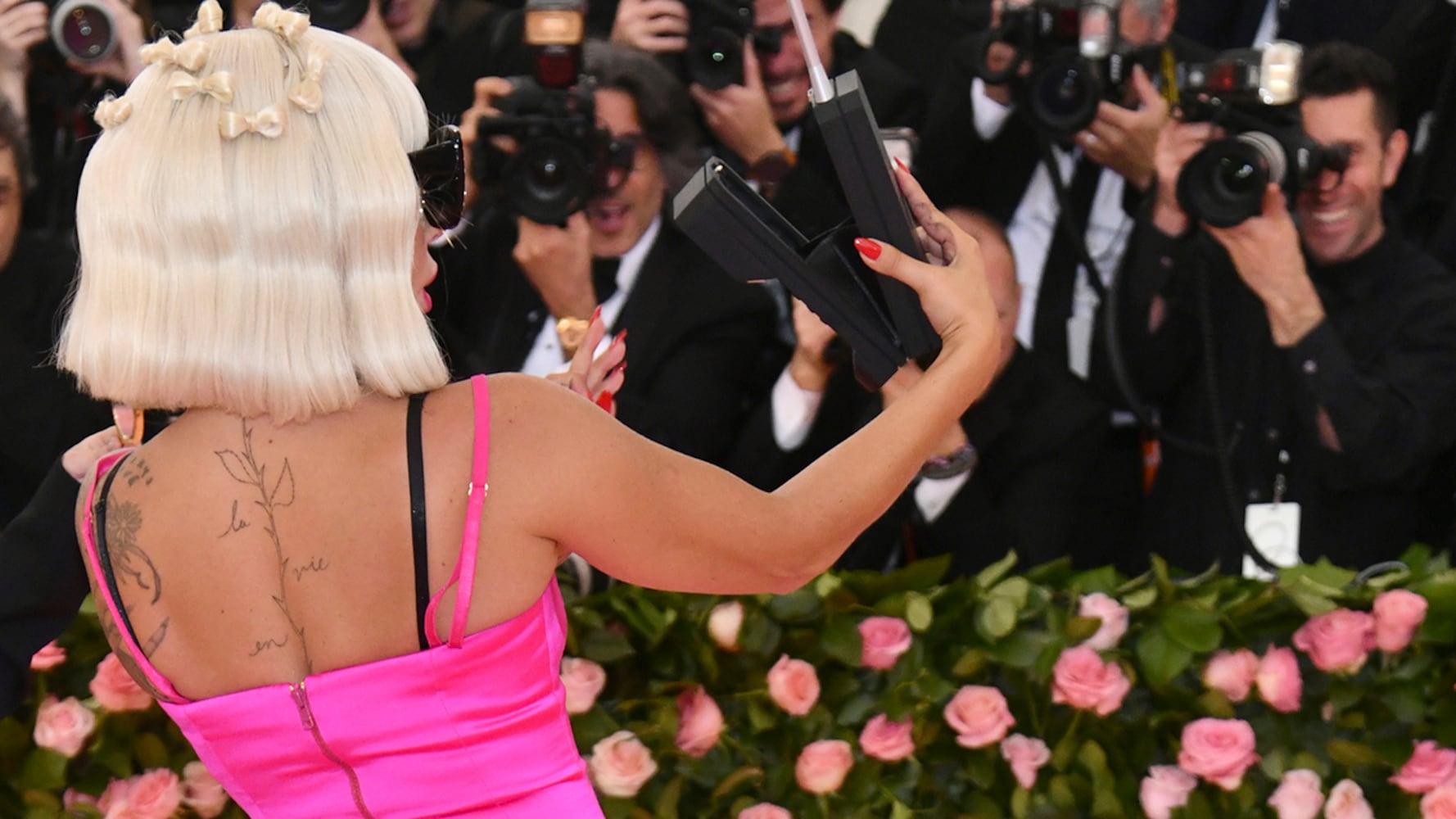 Photos: Lady Gaga’s big, pink red carpet arrival at 2019 MET Gala