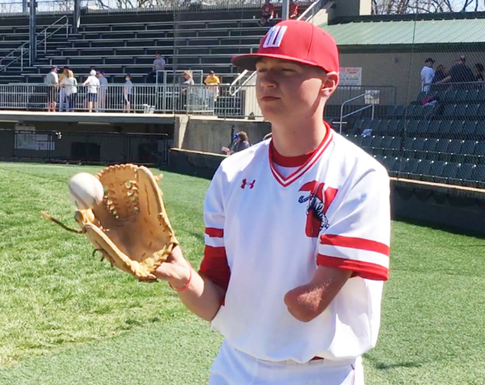 Wittenberg University pitcher Luke Campbell warms up at Springfield's Carleton Davidson Stadium on Sunday, April 9, 2017. MARC PENDLETON / STAFF