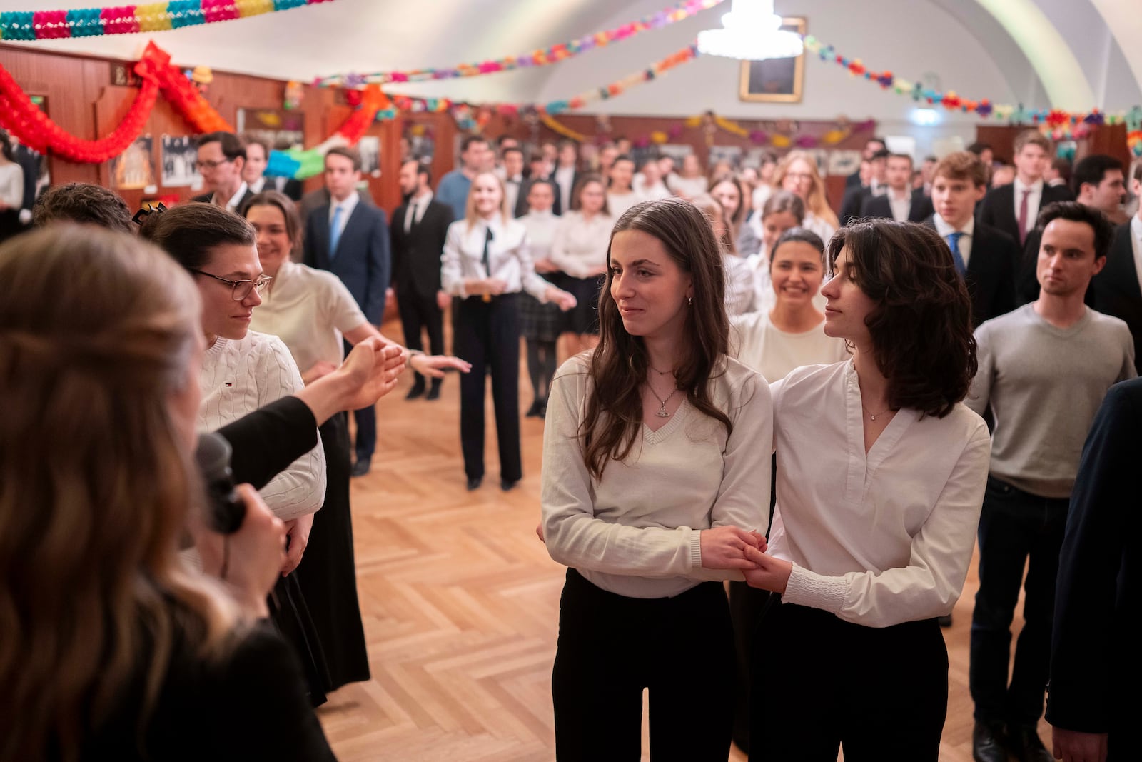 Young people learn the opening choreography for the Lawyers' Ball during a rehearsal in the Elmayer Dance School in Vienna, Austria, Sunday, Febr 23, 2025. (AP Photo/Denes Erdos)