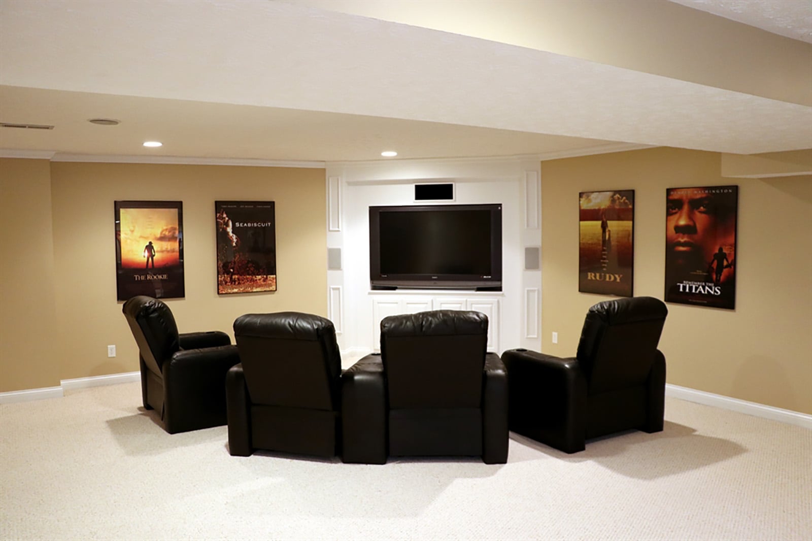 The basement has been finished into a recreation room with built-in media area. There is a bonus room, which is currently set up as an exercise room. CONTRIBUTED PHOTO BY KATHY TYLER