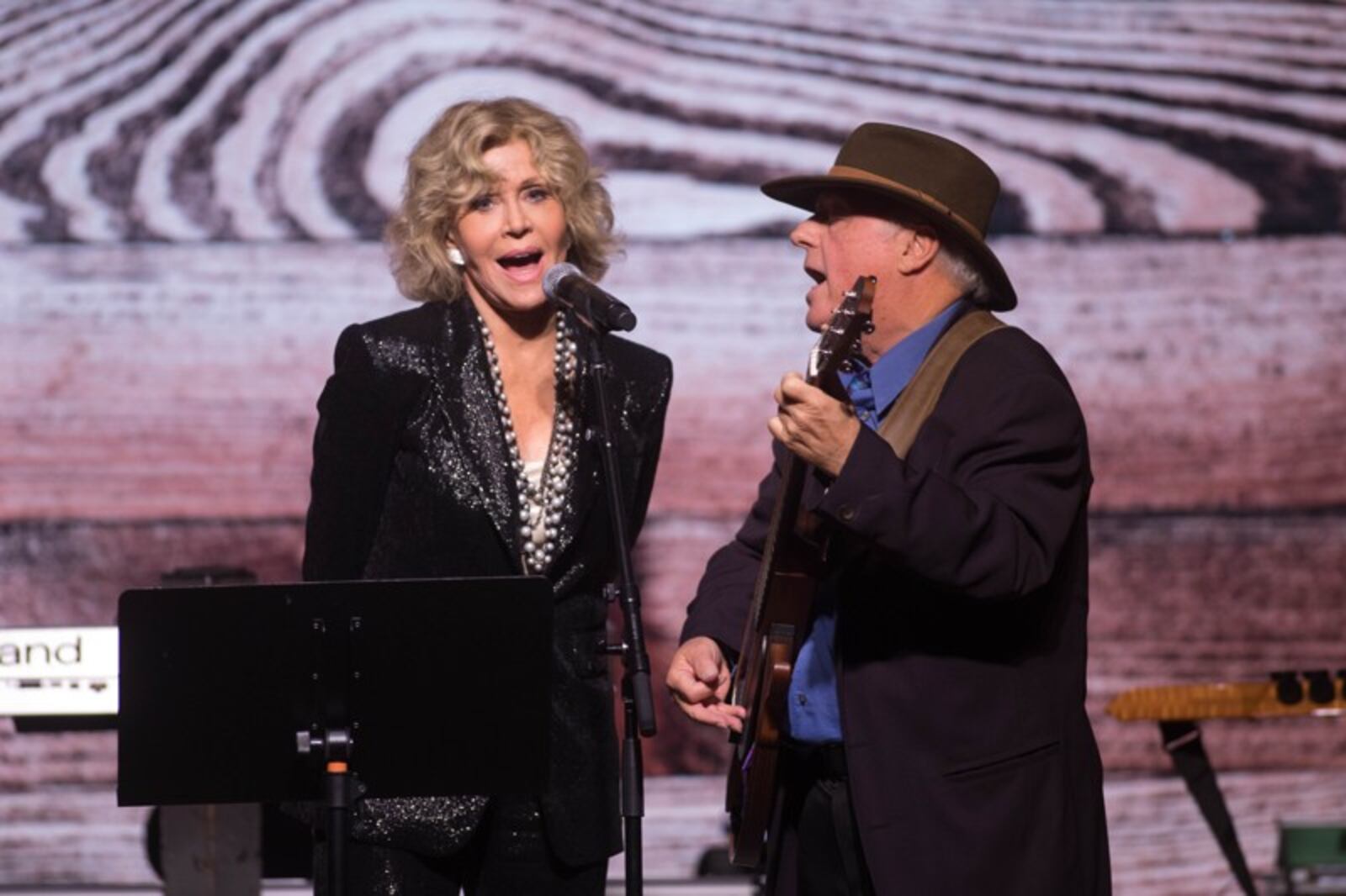 Jane Fonda and Jim Averitt sing to Ted Turner during Turner's 80th birthday party at the St. Regis Atlanta hotel, Saturday, Nov. 17, 2018.