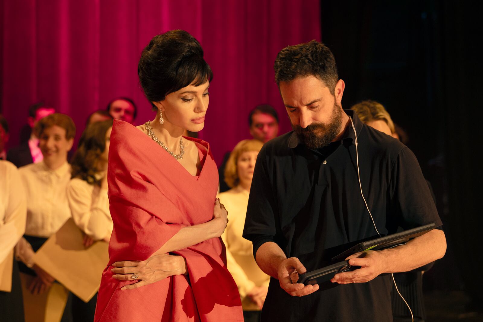 This image released by Netflix shows Angelina Jolie, left, with director Pablo Larraín on the set of "Maria." (Pax Jolie-Pitt//Netflix via AP)