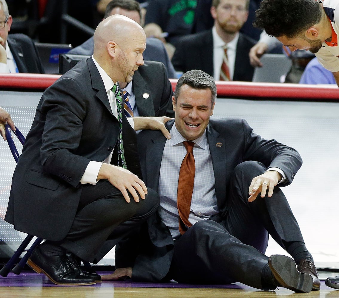 Virginia coach collapses at NCAA tourney