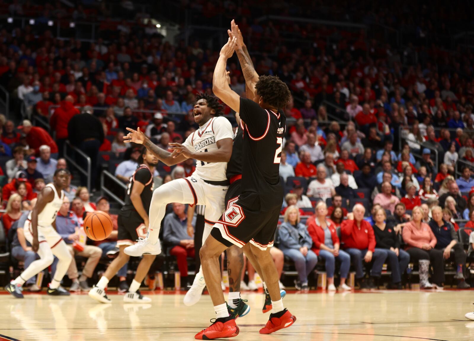 Dayton's Malachi Smith has the ball stripped as he drives to the basket against SIUE on Monday, Nov. 6, 2023, at UD Arena. Smith was injured on the play midway through the first half and did not return to the game. David Jablonski/Staff