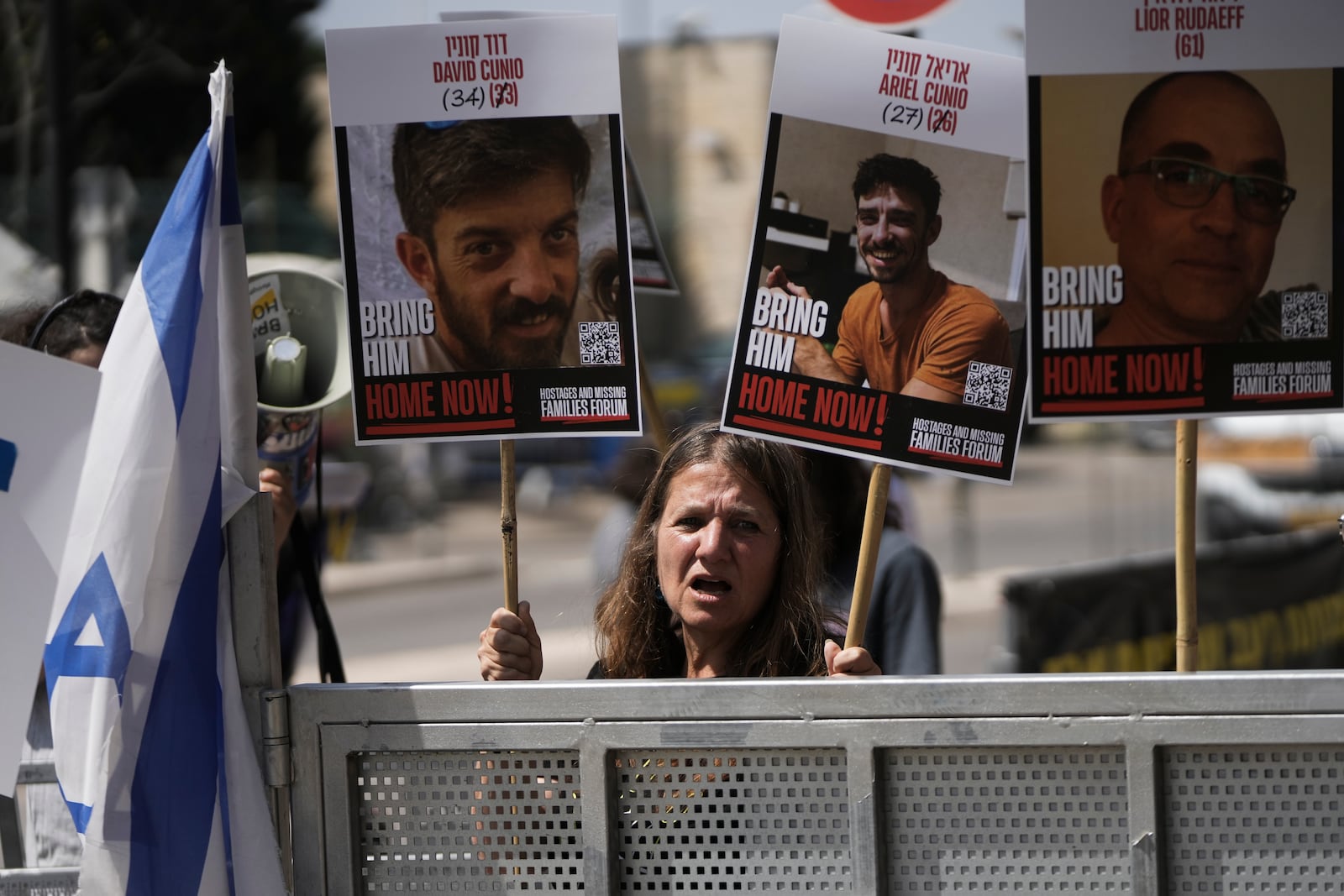 Israels calling for the release of hostages held in the Gaza Strip and saying the resumption of fighting in Gaza puts their loved ones at risk, outside the Knesset, Israel's parliament, in Jerusalem, Tuesday, March 18, 2025. (AP Photo/Mahmoud Illean)