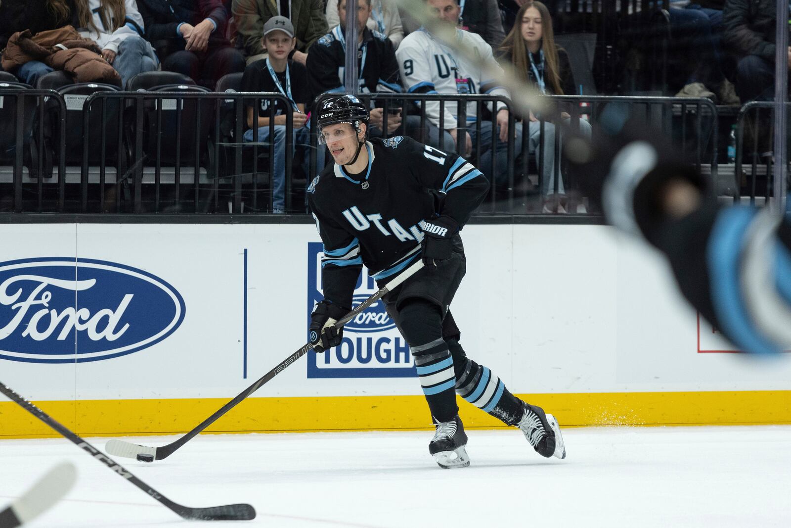 Utah Hockey Club center Nick Bjugstad (17) looks to shoot the puck against the Columbus Blue Jackets during the first period of an NHL hockey game Friday, Jan. 31, 2025, in Salt Lake City. (AP Photo/Melissa Majchrzak)