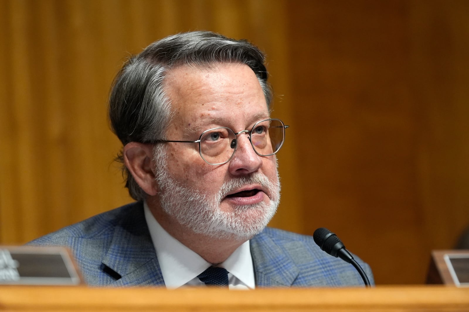 Ranking Member Gary Peters, D-Mich., speaks at the Senate Homeland Security and Governmental Affairs Committee confirmation hearing for South Dakota Gov. Kristi Noem, President-elect Donald Trump's nominee to be Secretary of Homeland Security, at the Capitol in Washington, Friday, Jan. 17, 2025. (AP Photo/Susan Walsh)