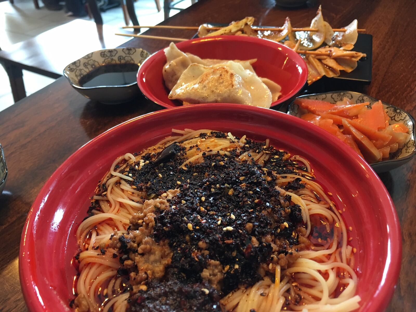 The Dan Dan noodles at Kung Fu Noodles feature kicky noodles mixed with fine ground pork, pickled long string beans, sesame paste and spicy garlic sauce. CONTRIBUTED/ALEXIS LARSEN