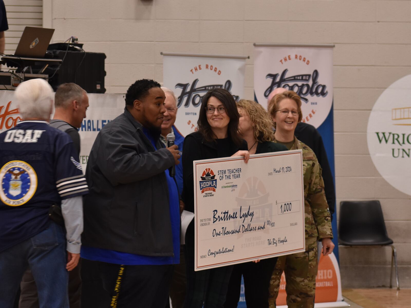 The Big Hoopla STEM Teacher Of The Year―Brittnee Lydy, a seventh grade science teacher at the Dayton Regional STEM School―was honored during the STEM Challenge’s opening ceremony on Sunday, March 17, at the Dayton Convention Center. SAMANTHA WILDOW\STAFF