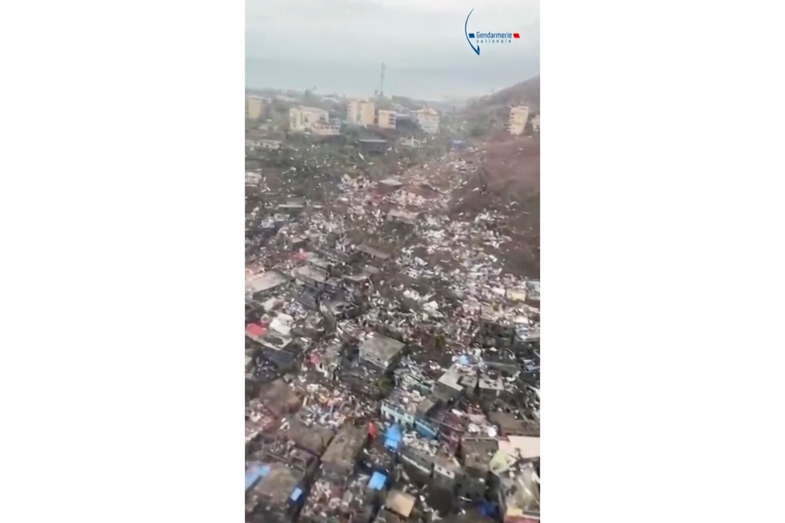 This image taken from video released by the Gendarmerie Nationale, shows massive damage from Cyclone Chido in the French territory of Mayotte, Sunday, Dec. 15, 2024. (Gendarmerie Nationale via AP)