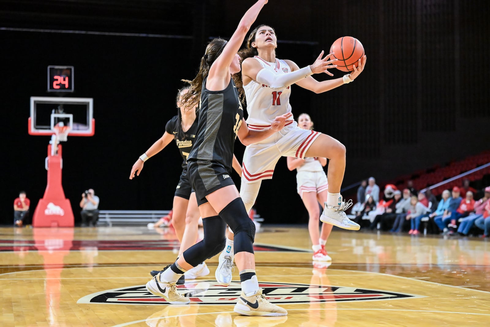 Enjulina Gonzalez goes up for a score against Purdue in a mid-December game. She had 18 points against the Boilermakers. Miami Athletics photo