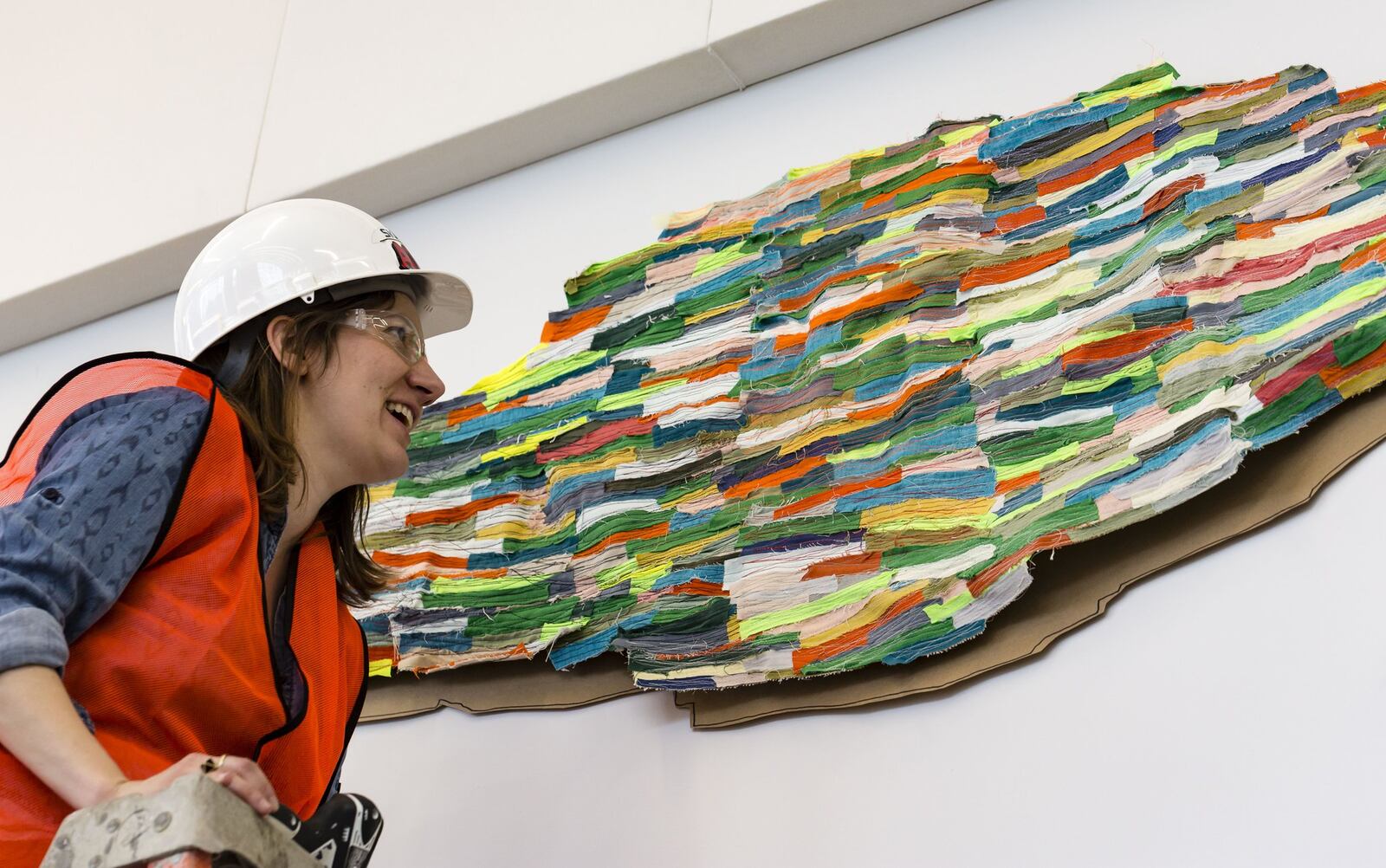 Artist Andrea Myers installs her work. CONTRIBUTED PHOTO BY ANDY SNOW