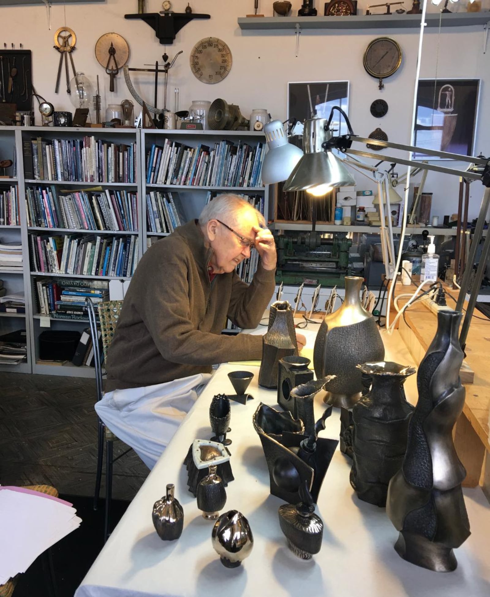 David Brand packing up his bronze vessel sculptures for an exhibition. CONTRIBUTED