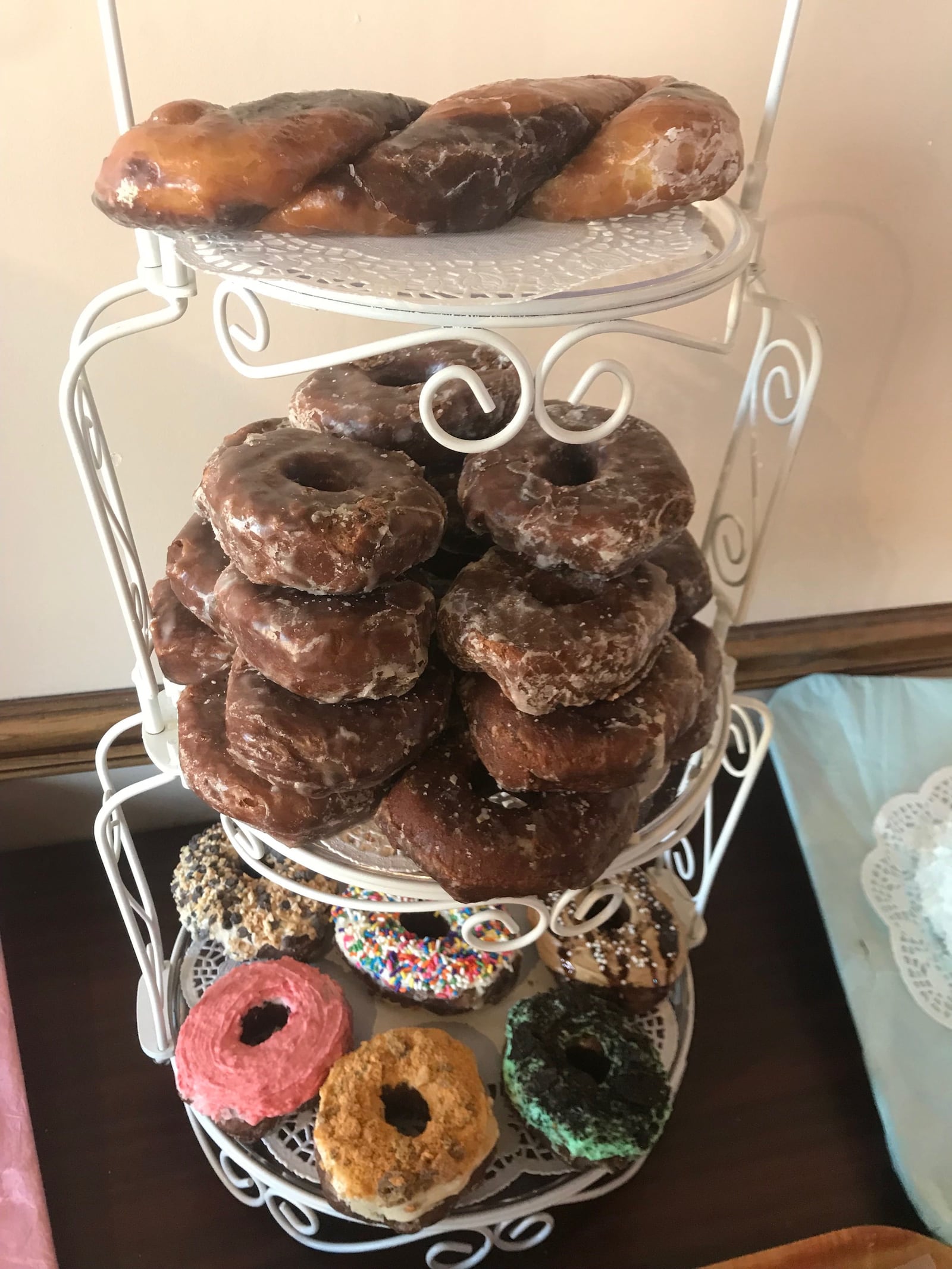 A collection of donuts made from Donut Palace's new chocolate yeast glazed donut batter.