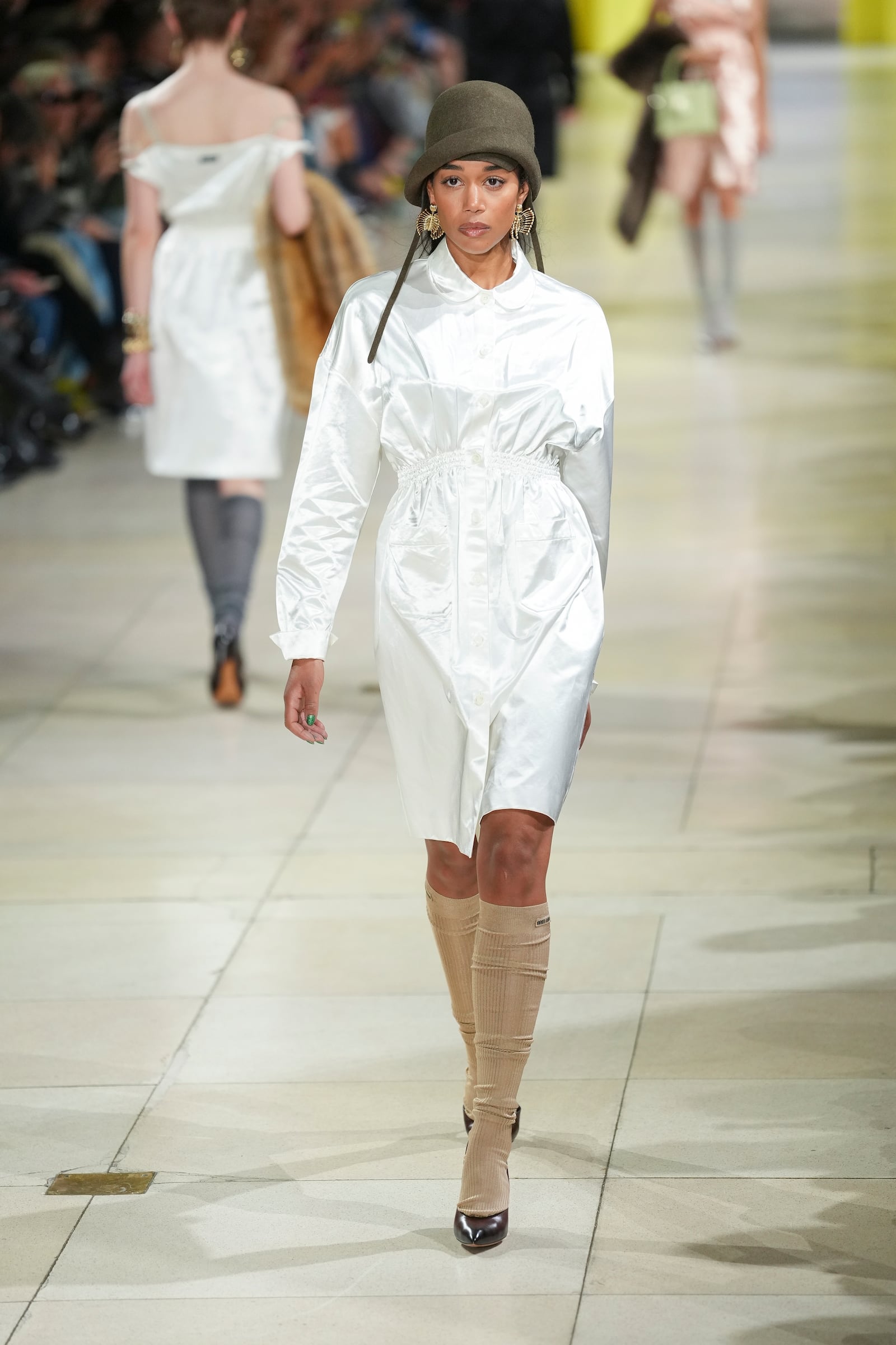 Laura Harrier wears a creation as part of the Miu Miu Fall/Winter 2025-2026 Womenswear collection presented Tuesday, March 11, 2025. in Paris. (Photo by Scott A Garfitt/Invision/AP)