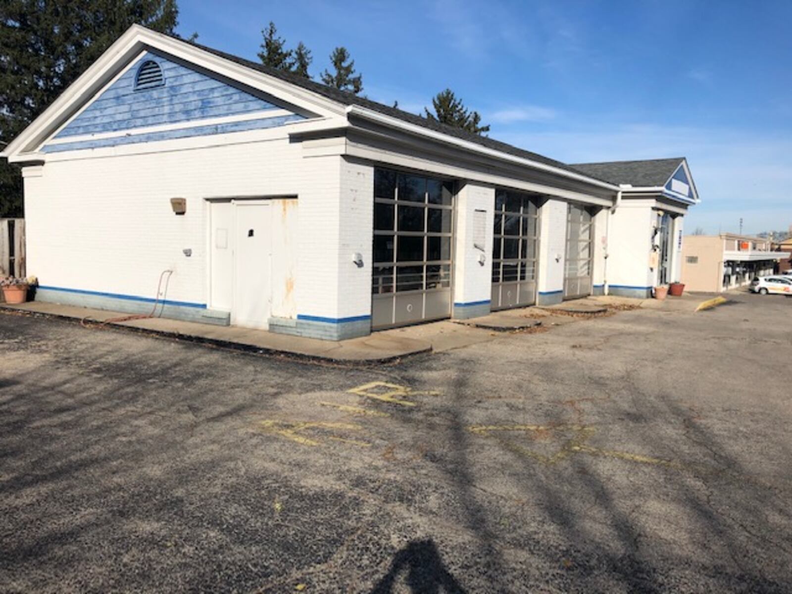 Northmont High School and University of Dayton grad Jeffrey Neace is looking to open a Whit's Frozen Custard at the former site of a service station on Ohio 48 in Centerville, near the city’s historic district. NICK BLIZZARD/STAFF