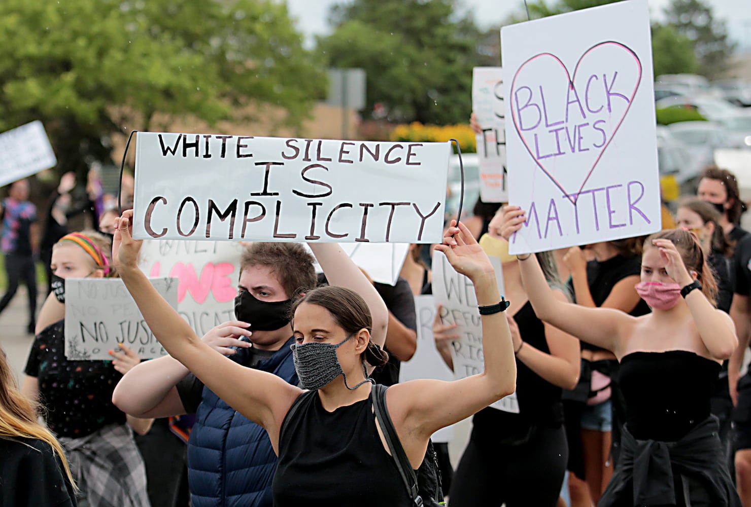 PHOTOS: Demonstrators rally for justice in Beavercreek