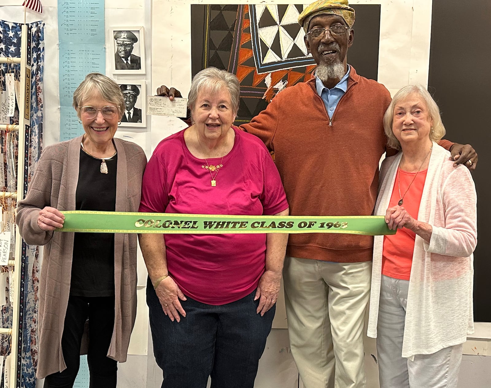 Bing Davis holds a check donated by the Col. White High School class of 1963; presenters (from left) are Barb (Fennel) Davis, Wava (Miller) Spring and Jewel Bledsoe-Blakely. Contributed 