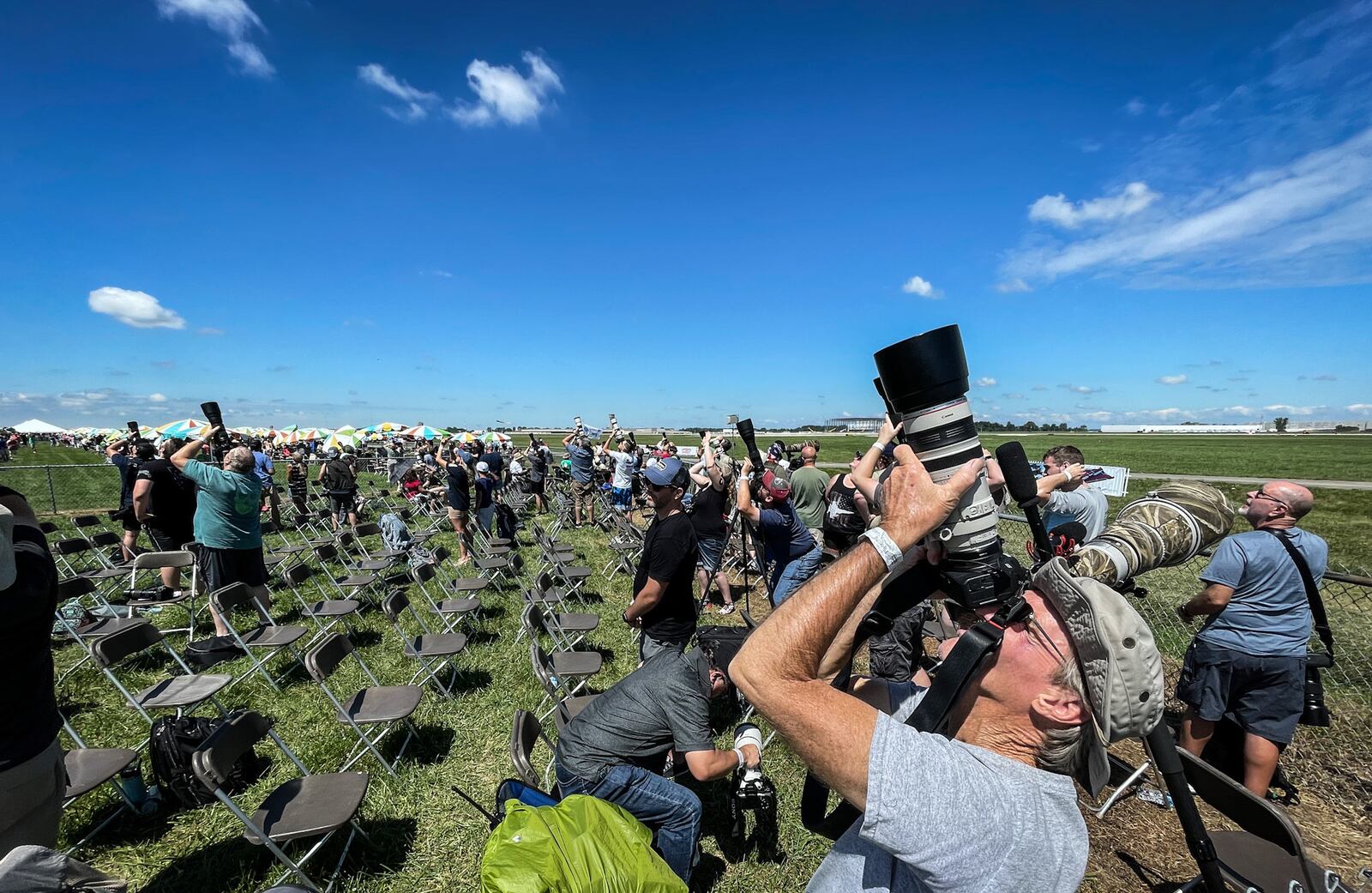 Dayton Air Show attendees watch the Army skydivers who starts the show.