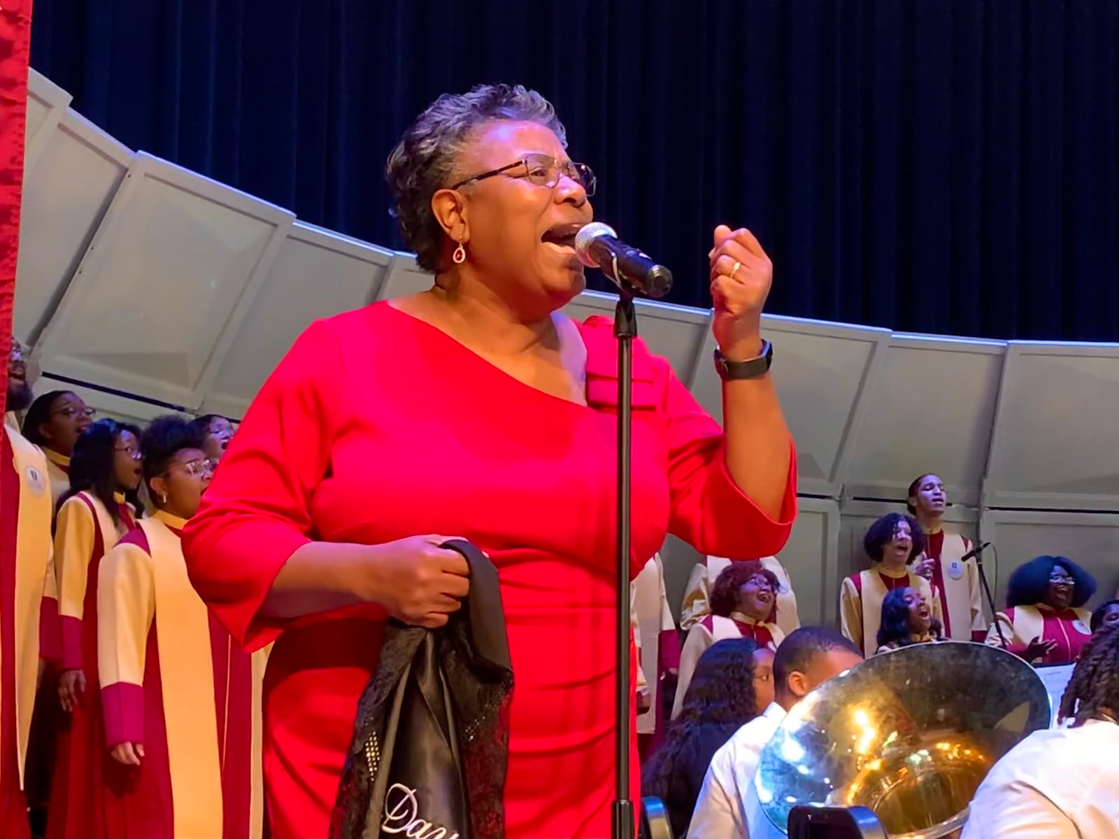 Singer Callie Day performs with the Central State University Chorus during the investiture of university President Jack Thomas on Friday, March 4, 2022. LONDON BISHOP/STAFF