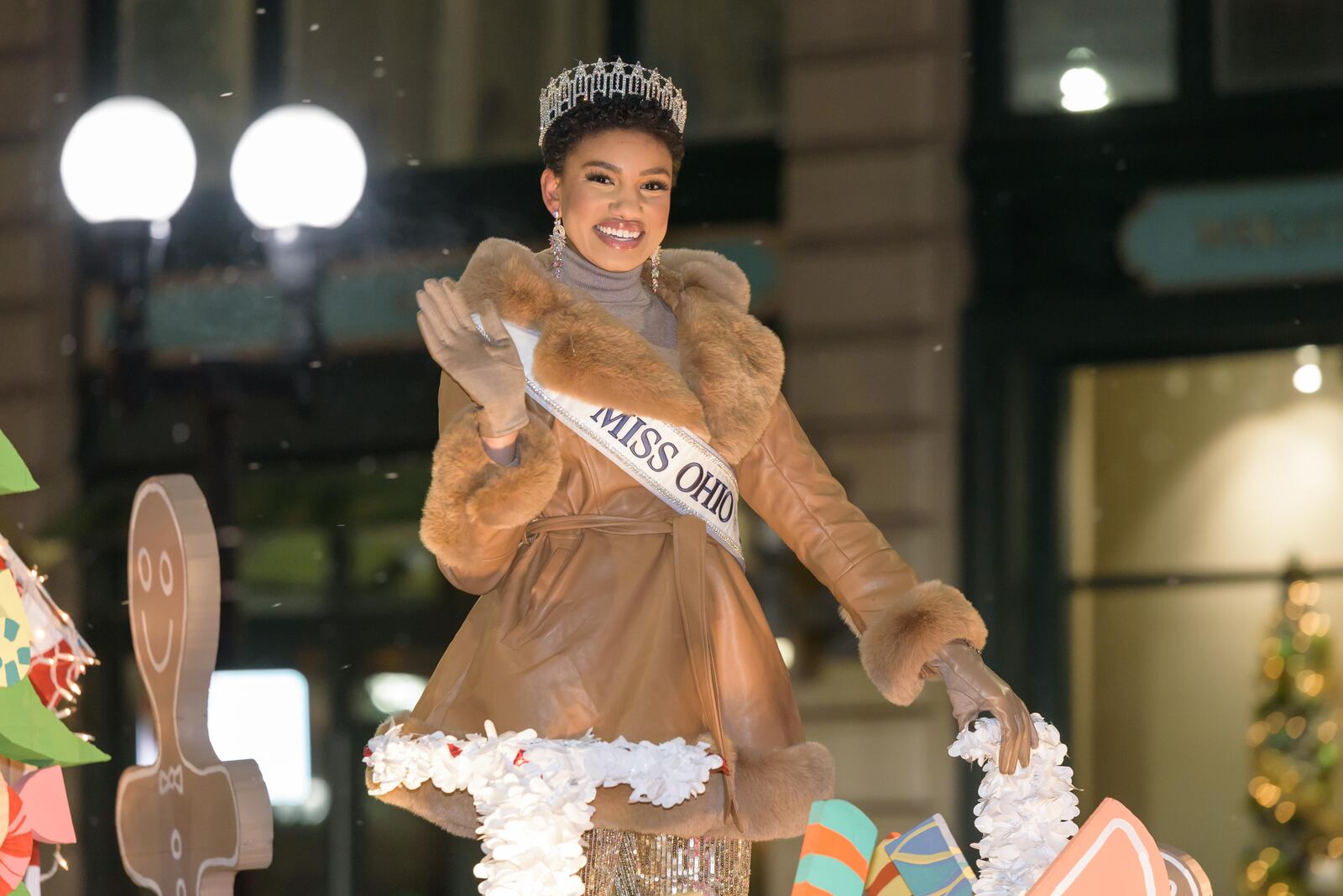 Miss Ohio USA 2024 Macy Hudson, a Dayton native and 2017 Stivers School for the Arts graduate, participated in the 52nd annual Dayton Holiday Festival featuring the Grande Illumination and Dayton Children’s Parade Spectacular in Lights in downtown Dayton on Friday, Nov. 29, 2024. TOM GILLIAM / CONTRIBUTING PHOTOGRAPHER