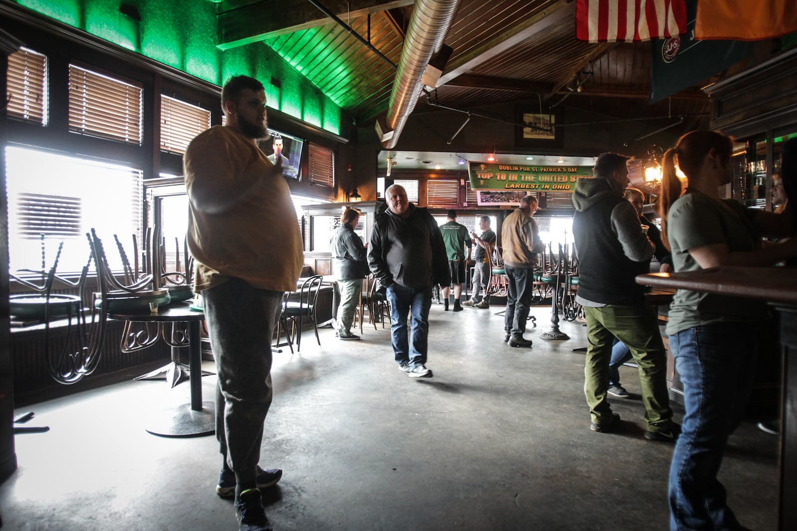 People waiting for carryout at Dublin Pub in Dayton/Jim Noelker, Staff