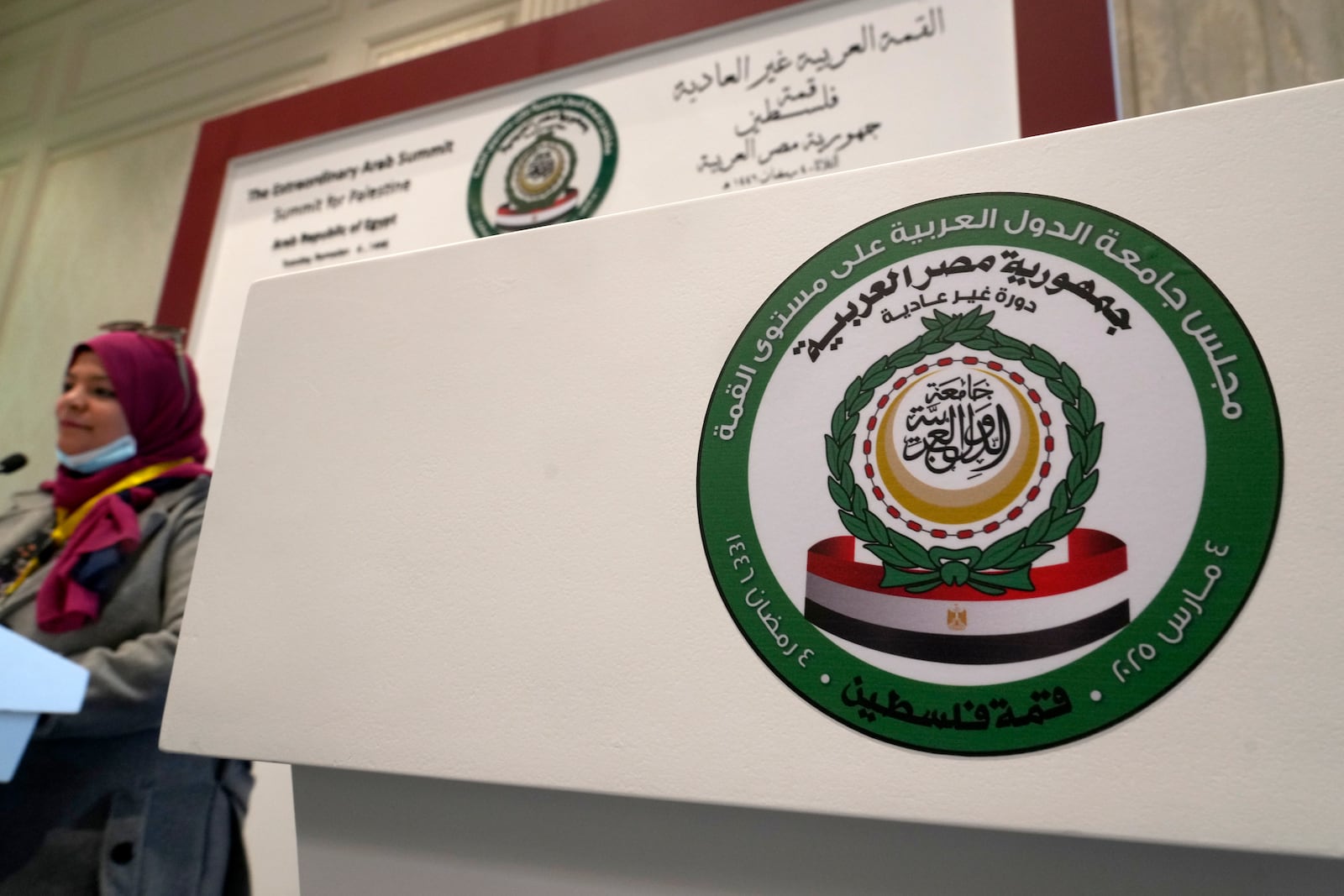 A logo in Arabic reads: "emergency Arab Summit Palestine summit" at the press center hall in Egypt's New Administrative Capital, outside Cairo, Tuesday, March 4, 2025. (AP Photo/Amr Nabil)