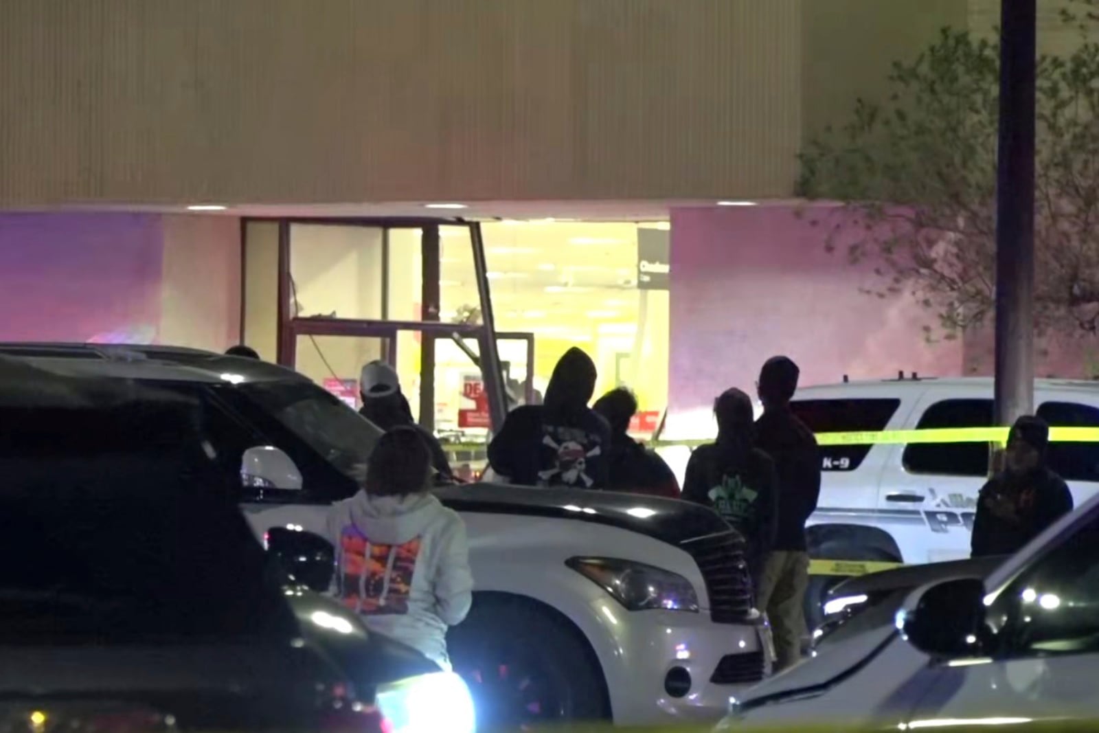 This image provided by KXXV shows police responding to a JC Penney at a shopping mall as people look on Saturday, Dec. 21, 2024, in Killeen, Texas. (KXXV via AP)