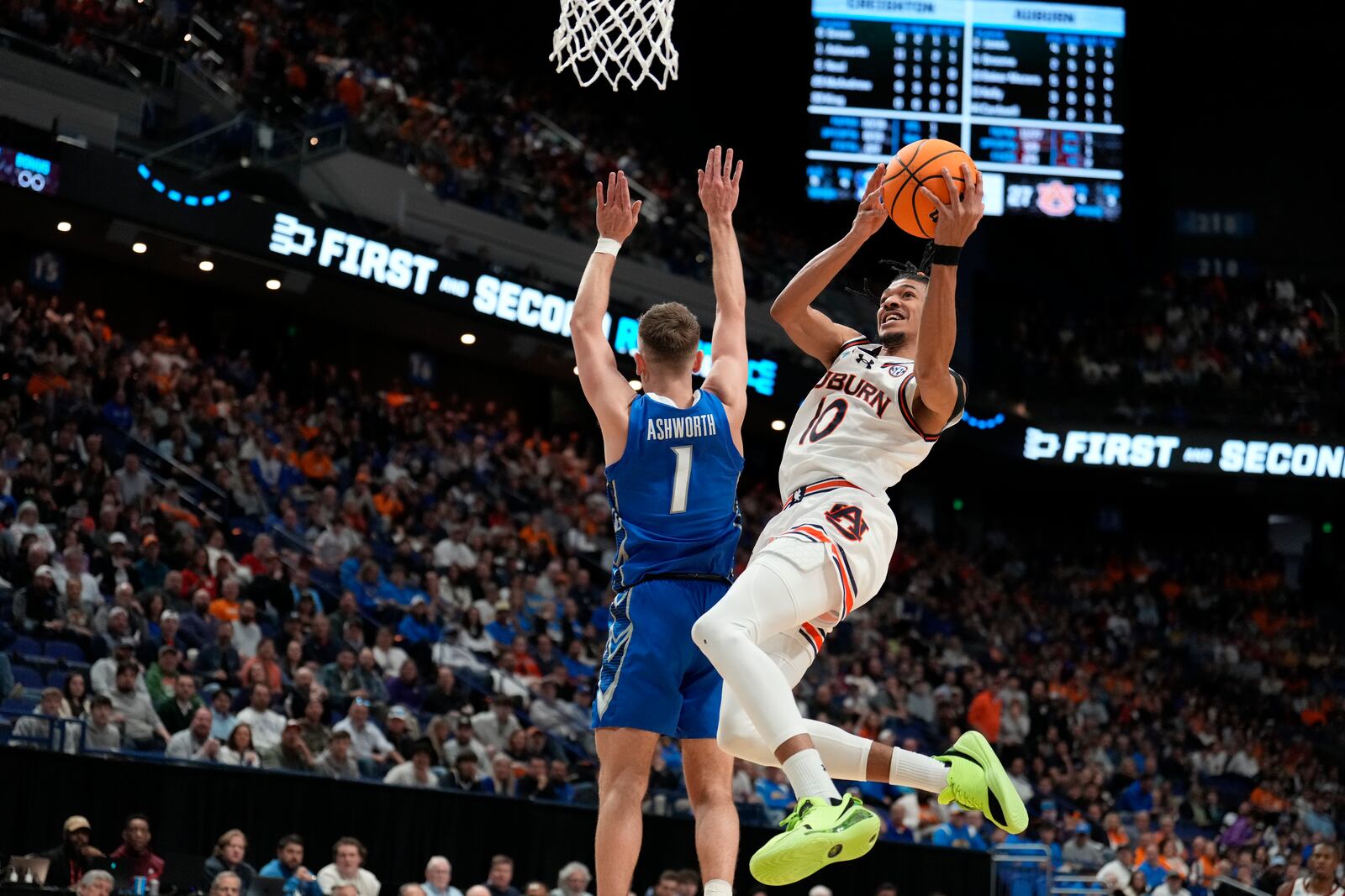 Auburn guard Chad Baker-Mazara (10) shoots the ball against Creighton guard Steven Ashworth (1) during the first half in the second round of the NCAA college basketball tournament, Saturday, March 22, 2025, in Lexington, Ky. (AP Photo/Brynn Anderson)