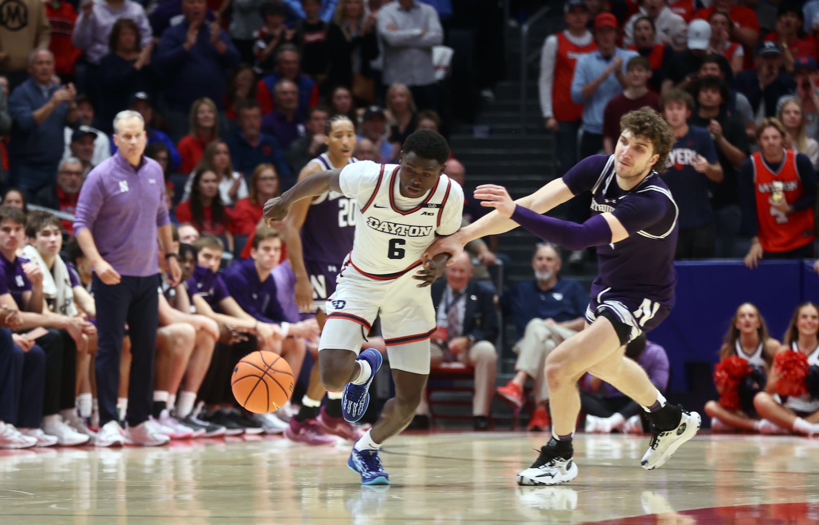 Dayton's Enoch Cheeks steals the ball against Northwestern on Saturday, Nov. 9, 2024, at UD Arena. David Jablonski/Staff