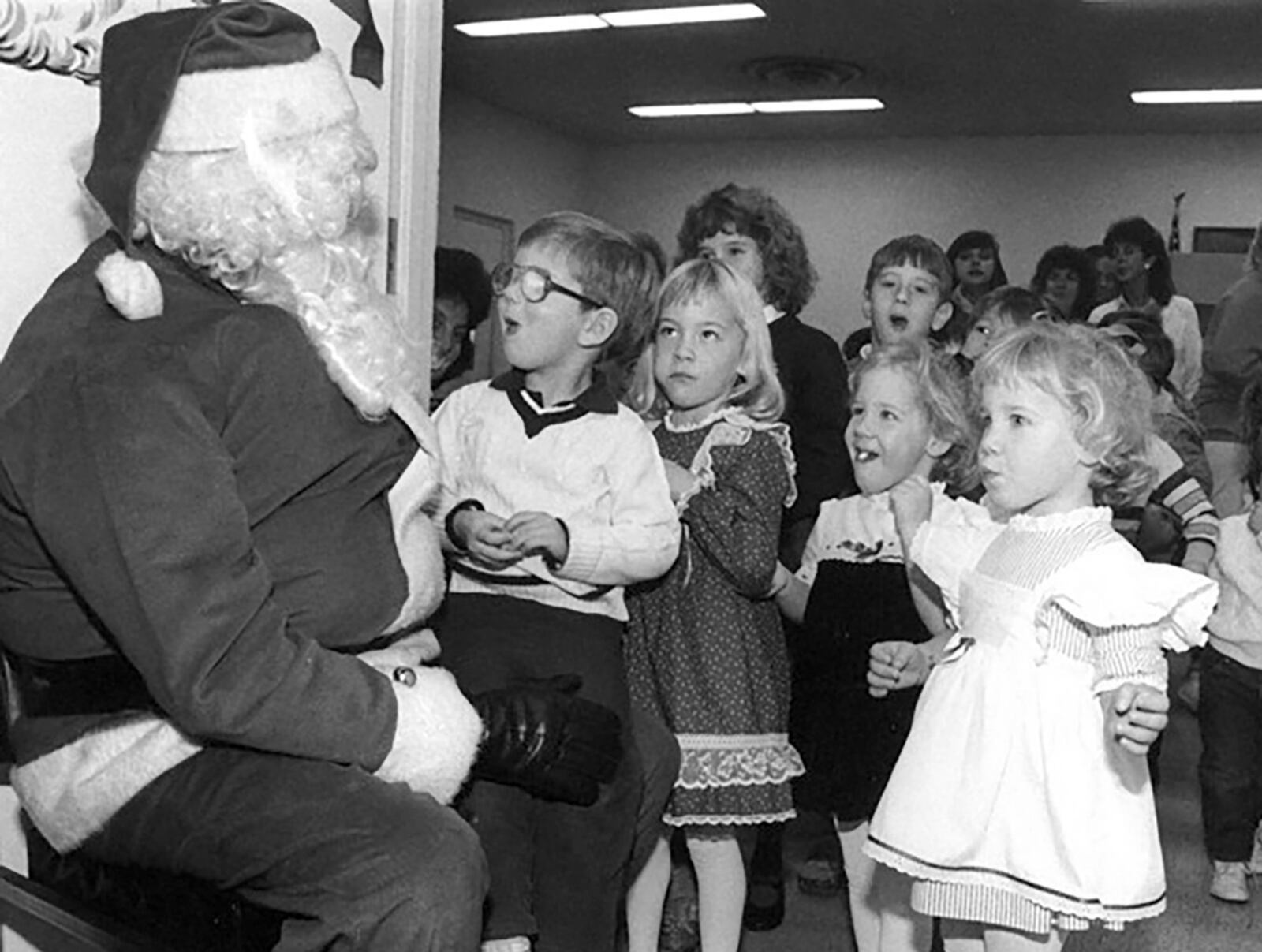 Children wait to visit Santa Claus at a Christmas party hosted by the Fairfield Parks Board at the Fairfield City Hall in December 1987. JOURNAL-NEWS ARCHIVES