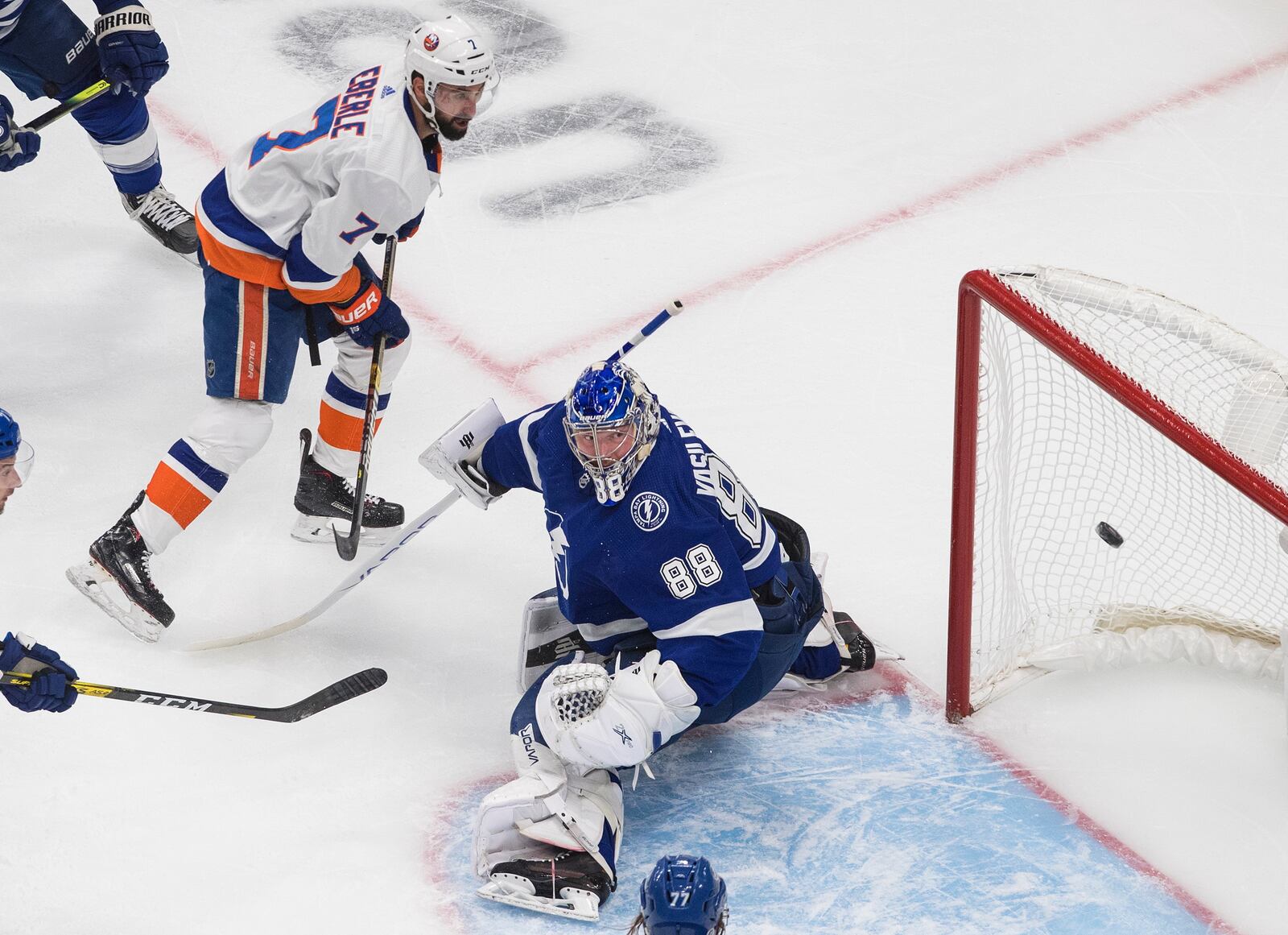 Tampa Bay Lightning goalie Andrei Vasilevskiy (88) makes the save on New York Islanders' Jordan Eberle (7) during the first period of Game 2 of the NHL hockey Eastern Conference final, Wednesday, Sept. 9, 2020, in Edmonton, Alberta. (Jason Franson/The Canadian Press via AP)