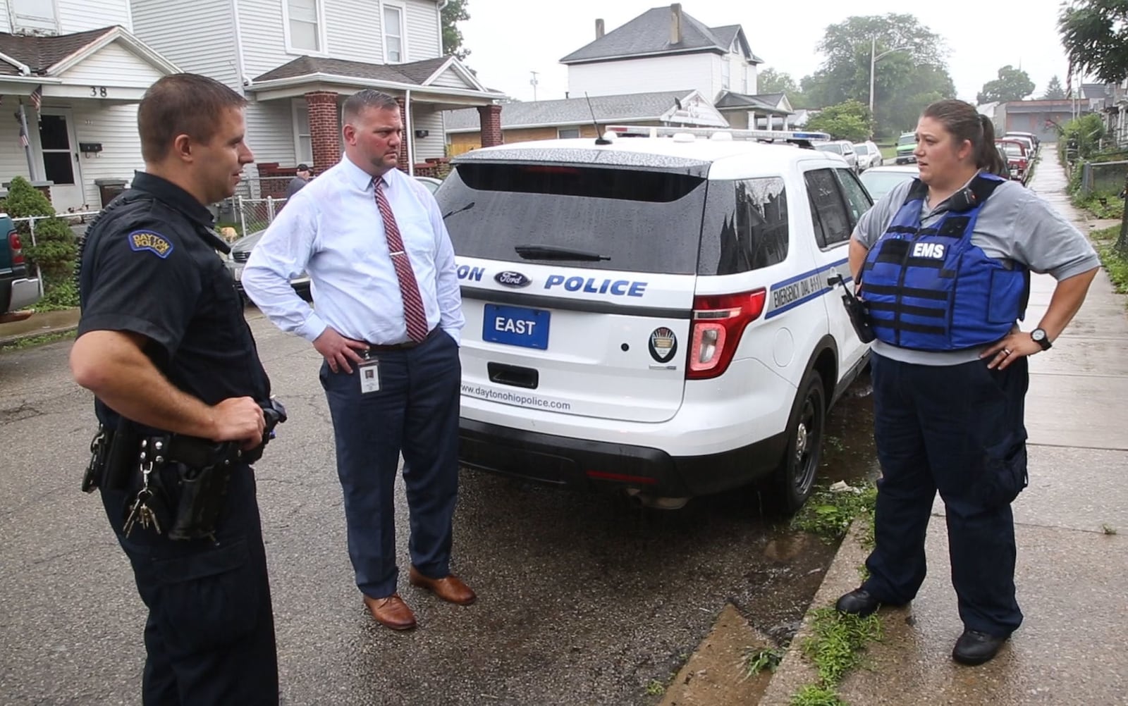 Dayton Police Addiction Liaison Officer Jason Olson, left, Dayton’s Deputy City Manager Joe Parlette, and Dayton Fire Department Addiction Resource Liaison/EMT Amy Dunkin talk about their attempts to connect with opioid addicts to assist them with finding treatment. Overdose response teams are being funded across Ohio by Cures Act money.  TY GREENLEES / STAFF