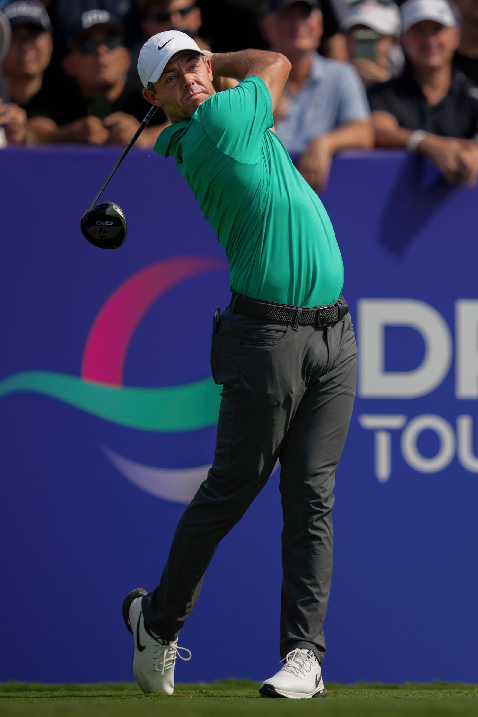 Rory McIlroy of Northern Ireland hits off the first tee during the first round of World Tour Golf Championship in Dubai, United Arab Emirates, Thursday, Nov. 14, 2024. (AP Photo/Altaf Qadri)