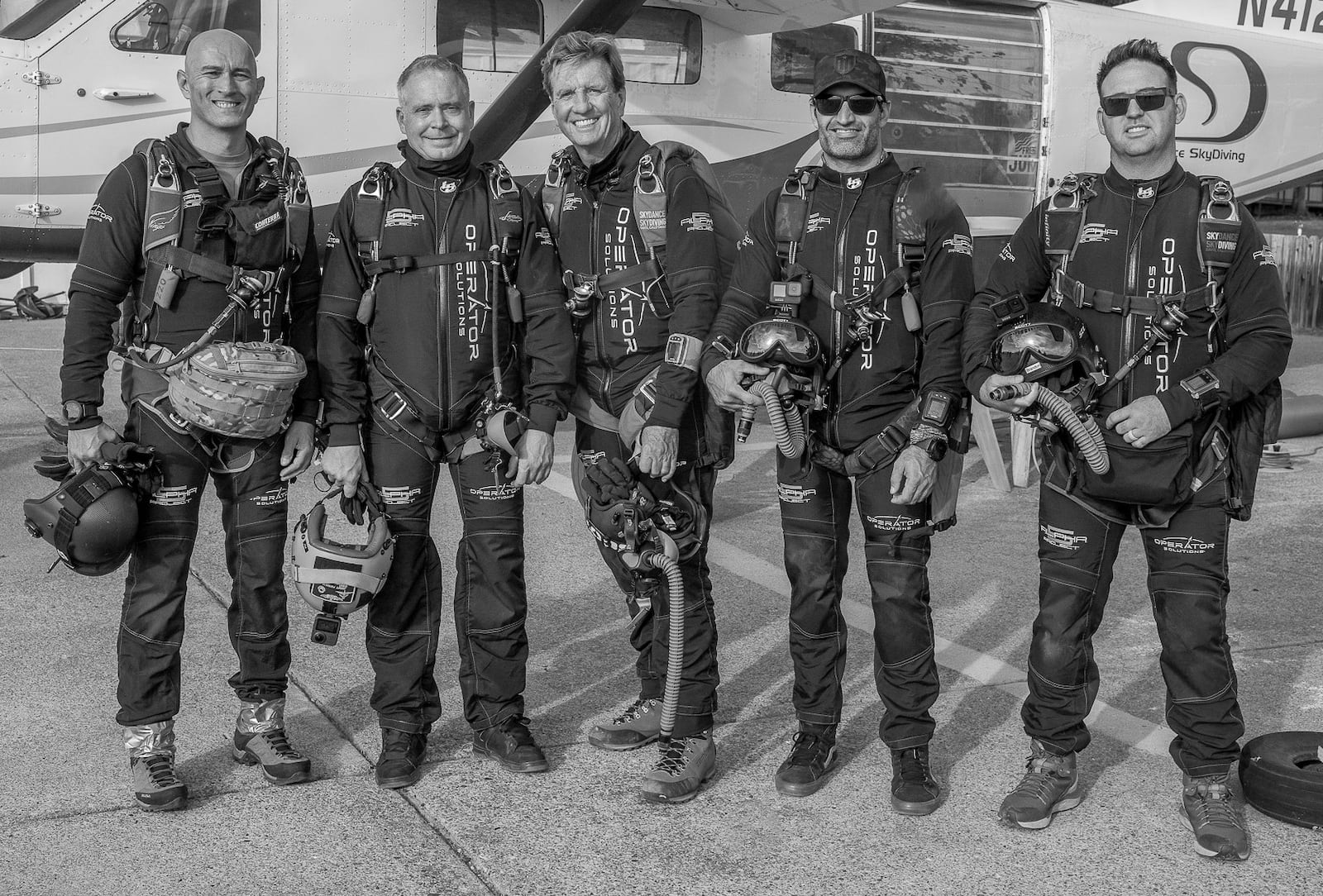 Members of the Alpha 5 Project before a training jump in Davis, California. From left: CMSgt. (Ret) Chris Lais, MSgt. (Ret) Jimmy Petrolia, Larry Connor, MSgt. Rob Dieguez, CMSgt. Brandon Daugherty. Alex Nicks/CONTRIBUTED