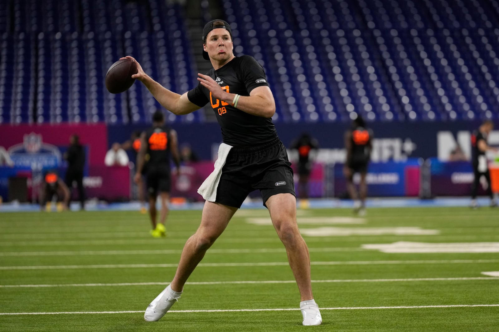 Notre Dame quarterback Riley Leonard runs a drill at the NFL football scouting combine in Indianapolis, Saturday, March 1, 2025. (AP Photo/George Walker IV)