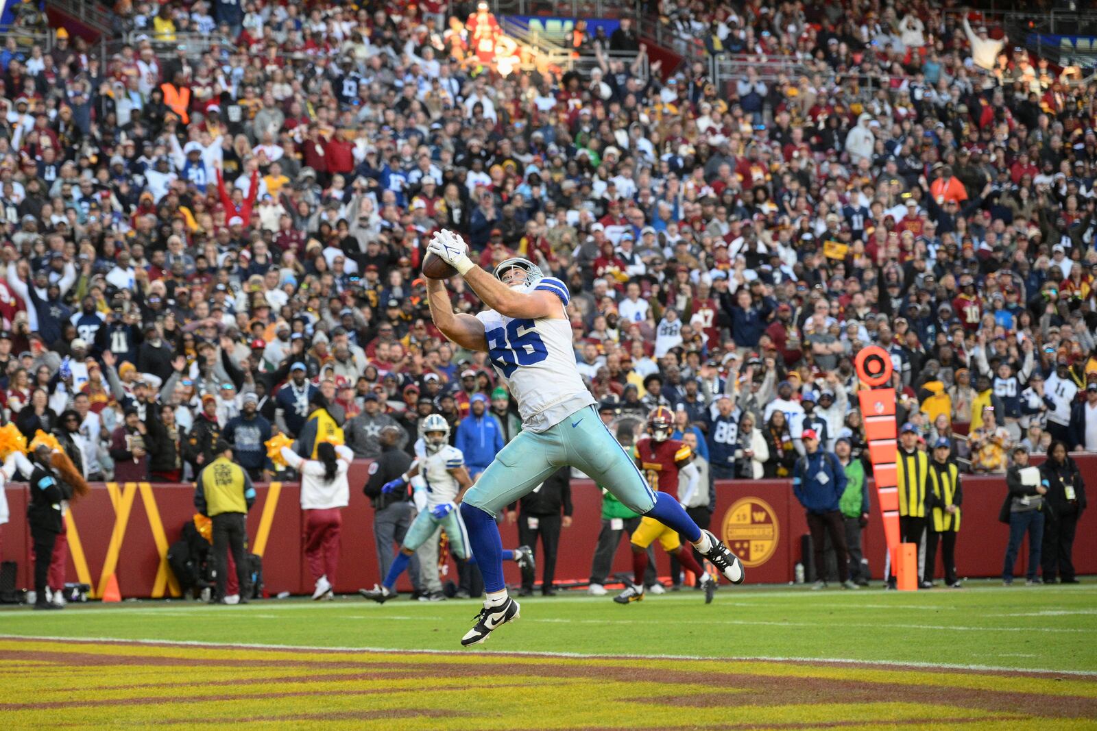 Dallas Cowboys tight end Luke Schoonmaker (86) catches a 22-yard touchdown pass during the second half of an NFL football game against the Washington Commanders, Sunday, Nov. 24, 2024, in Landover, Md. (AP Photo/Nick Wass)