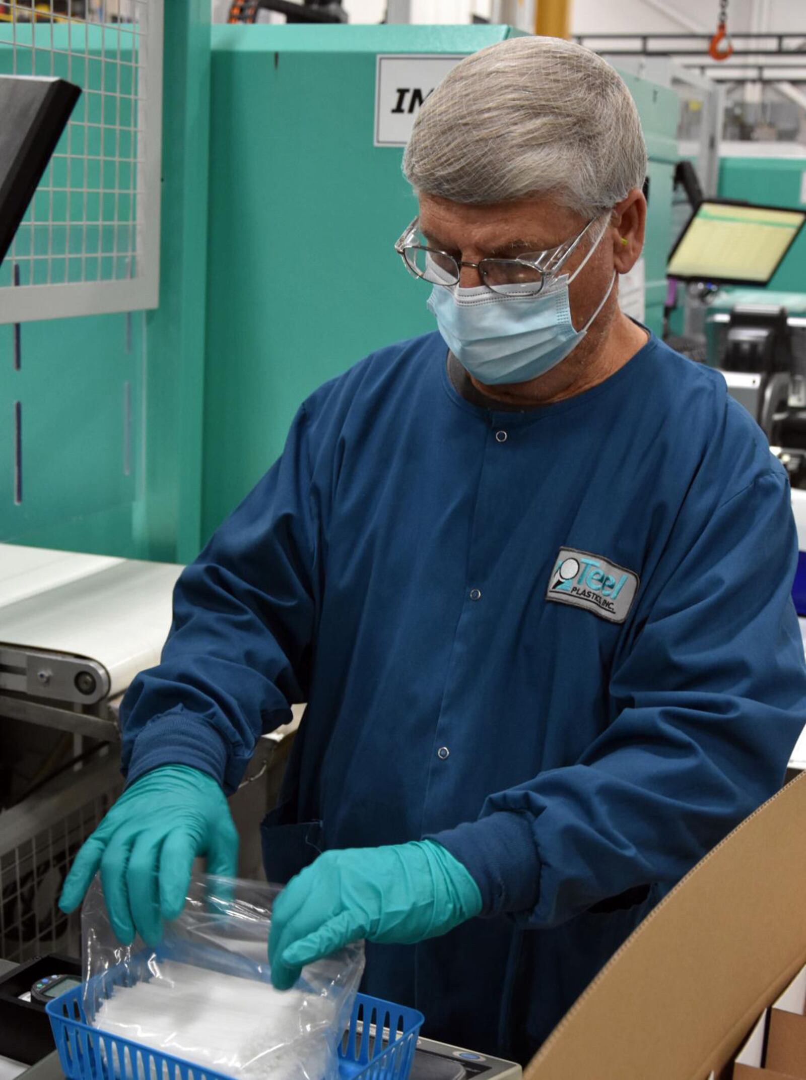 Teel Plastics employee Ken Popp arranges COVID-19 testing swabsticks at the manufacturing facility in Baraboo, Wisconsin. Members of the Strategic Warning and Surveillance Systems Division of the Digital Directorate awarded a $6.98 million firm-fixed-price contract to Teel in mid-October. CONTRIBUTED PHOTO/TEEL PLASTICS