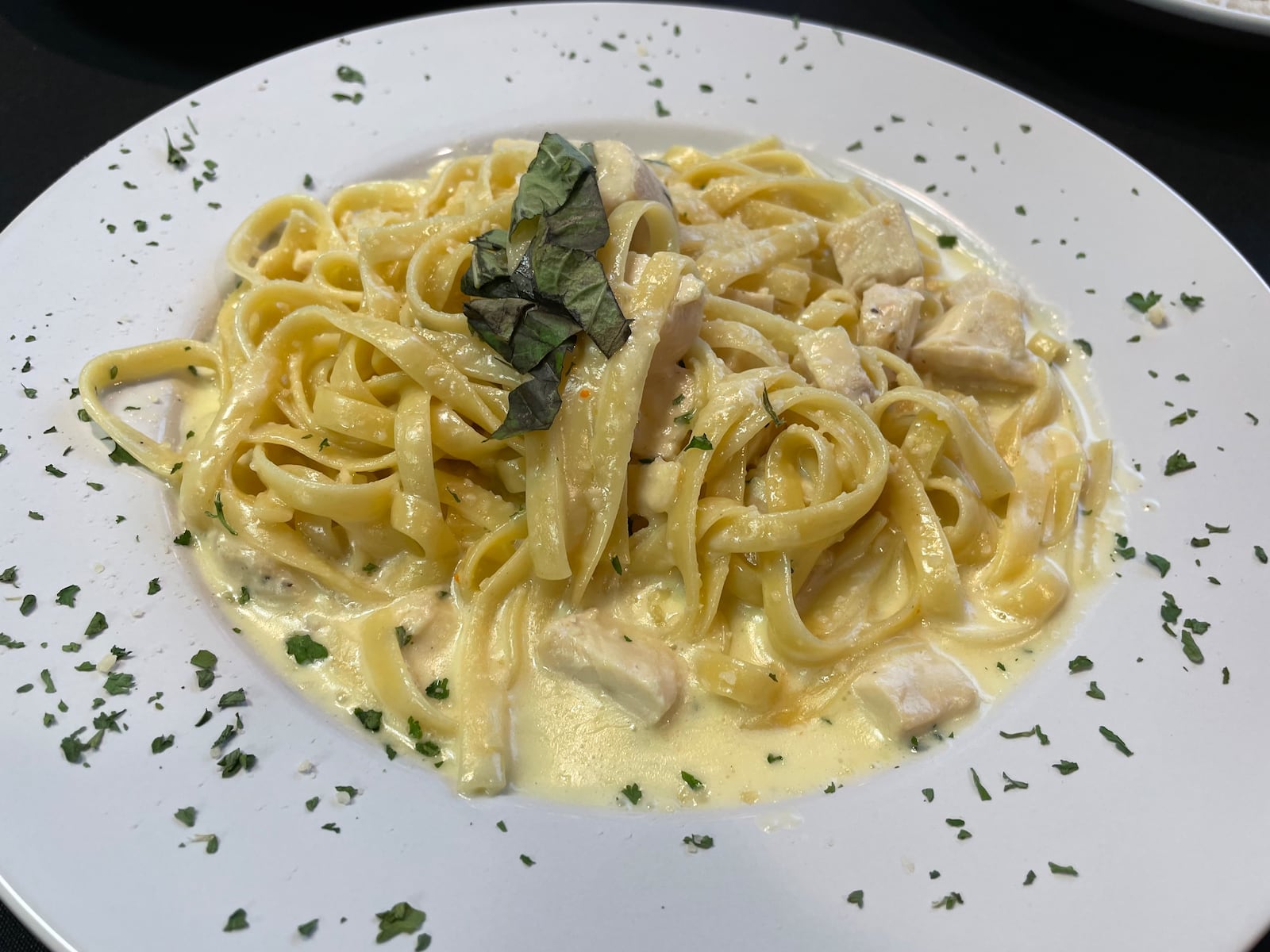 Jimmy’s Italian Cuisine & Bar is opening its doors in downtown Dayton at 824 E. Fifth St. on Wednesday, May 1. Pictured is the Chicken Fettuccine Alfredo. NATALIE JONES/STAFF