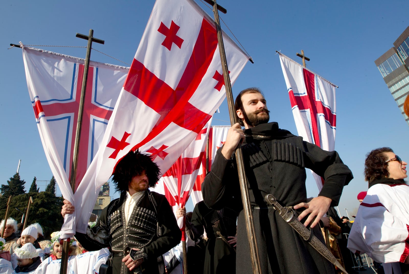 FILE - Georgians take a part in a religious procession to mark Orthodox Christmas in Tbilisi, Georgia, on Jan. 7, 2020. (AP Photo/Shakh Aivazov, File)