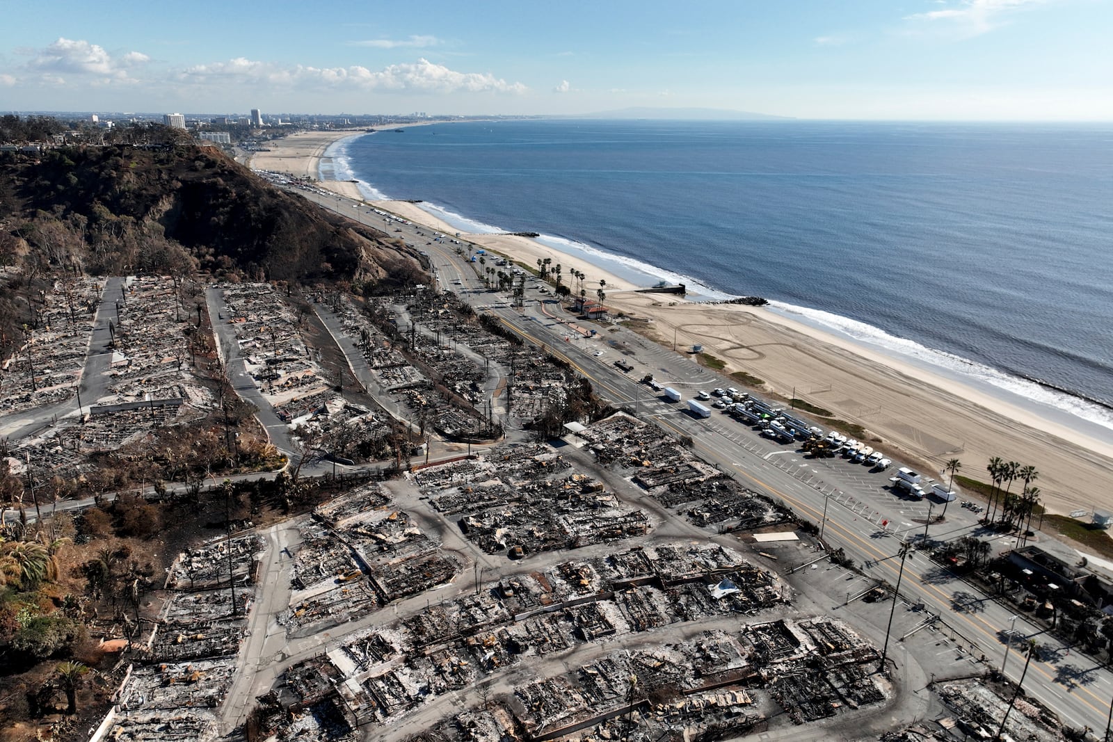 An aerial view shows the devastation left by the Palisades Fire in the Pacific Palisades section of Los Angeles, Monday, Jan. 27, 2025. (AP Photo/Jae C. Hong)