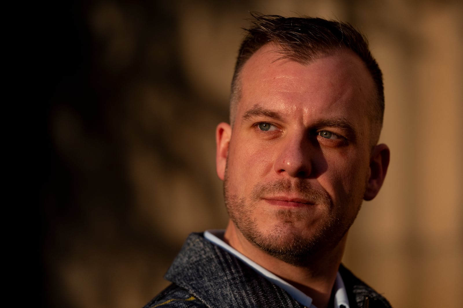 Recreational rugby player Sean McDowell, whose SafeSport case investigator Jason Krasley was fired after being arrested for stealing drug money in his previous job as a police officer, poses for a portrait Wednesday, Dec. 18, 2024, in Seattle. (AP Photo/Lindsey Wasson)