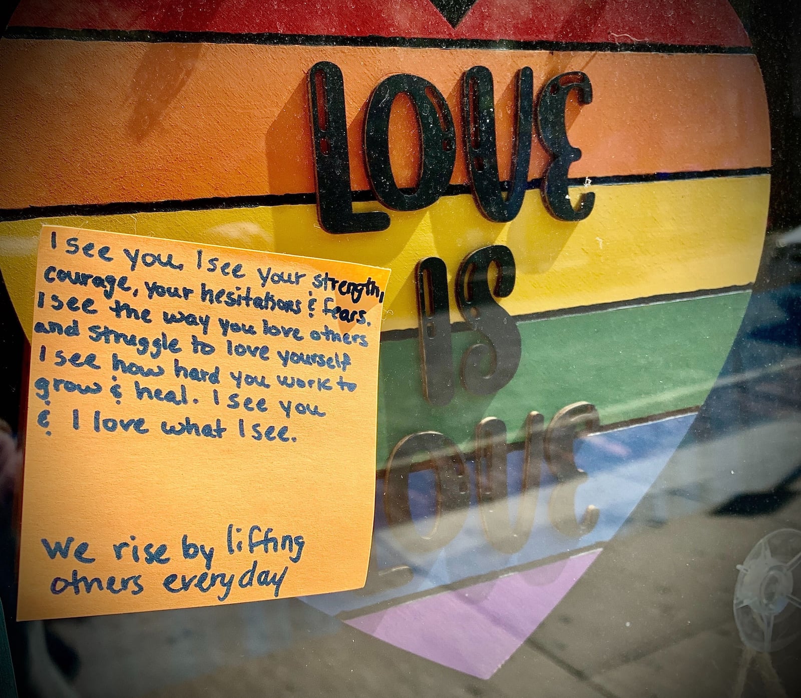 Messages of faith and hope appear on windows in the Oregon District Tuesday Aug. 2, 2021. MARSHALL GORBY\STAFF