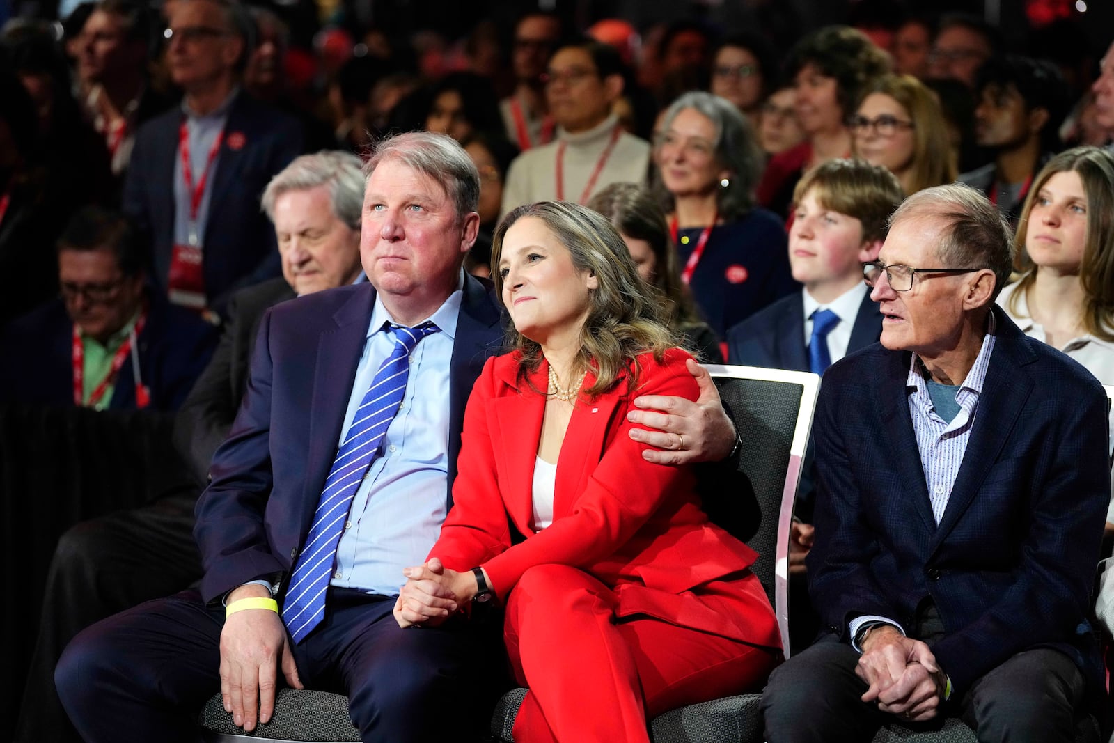 Chrystia Freeland listens to the speech of Mark Carney, Leader of the Liberal Party of Canada, not shown, at the Liberal Leadership Event in Ottawa, Ontario, Sunday, March 9, 2025. (Justin Tang/The Canadian Press via AP)